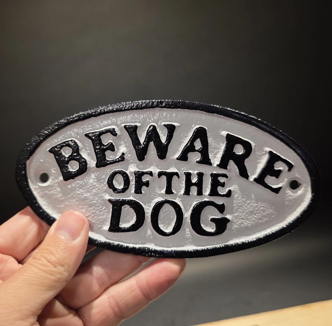 6 1/2" Cast iron Beware of the Dog Sign Plaque: 6 1/2" Wide This reproduction cast iron sign is a classic piece of functional hardware with a traditional, rustic aesthetic. it is commonly used as a gate or fence plaque to inform visitors of a dog o
