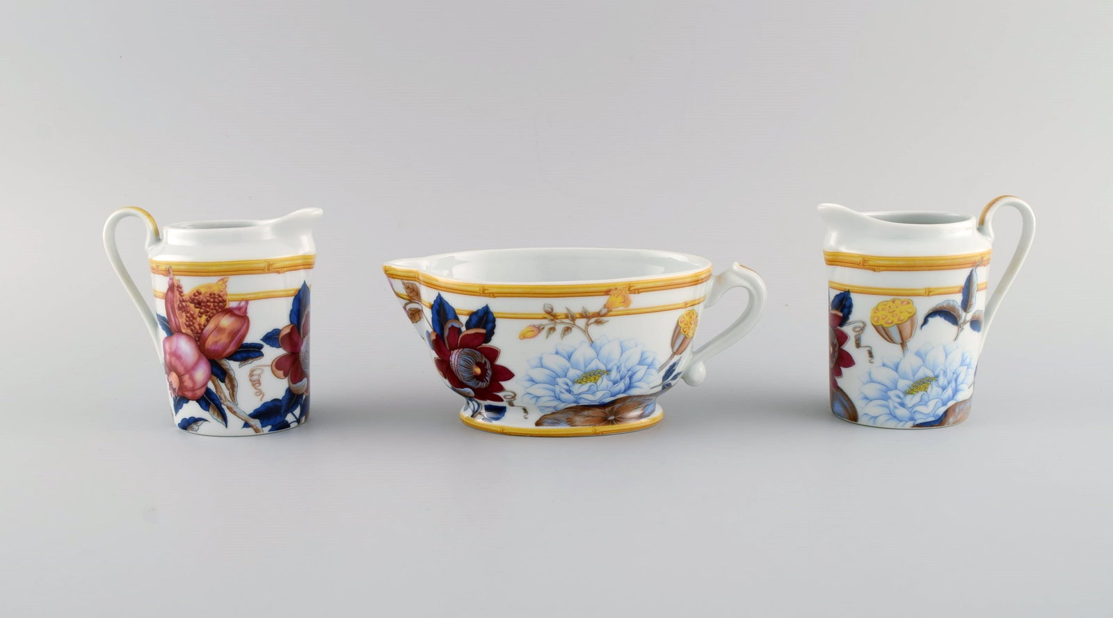 Porcelain of Paris. "Tropical Aurore". Three porcelain jugs decorated with flowers, pomegranates and - 2