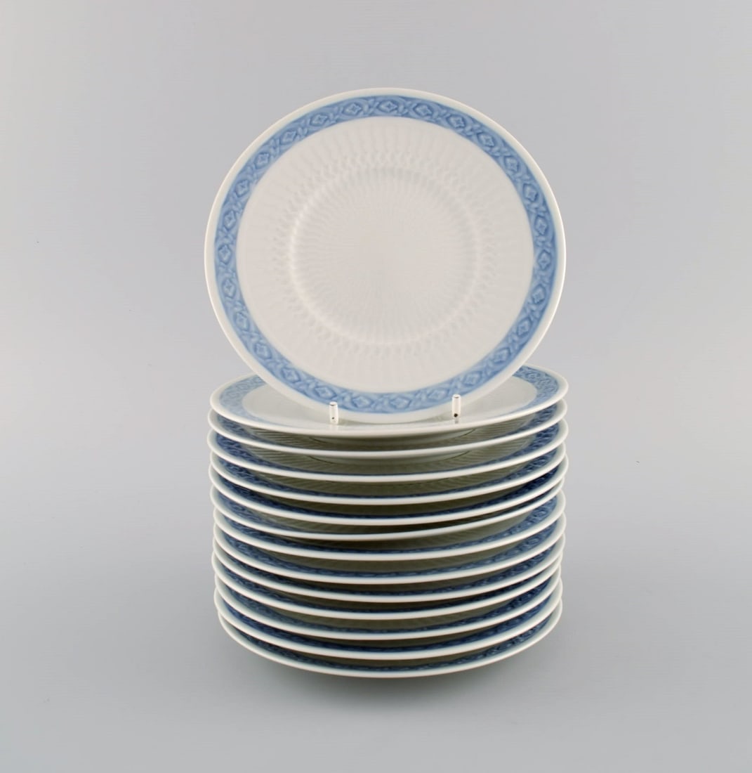 14 Royal Copenhagen Blue Fan side plates. 1960s. Model number 1212/1522. Designed by Arnold Krog in - 2