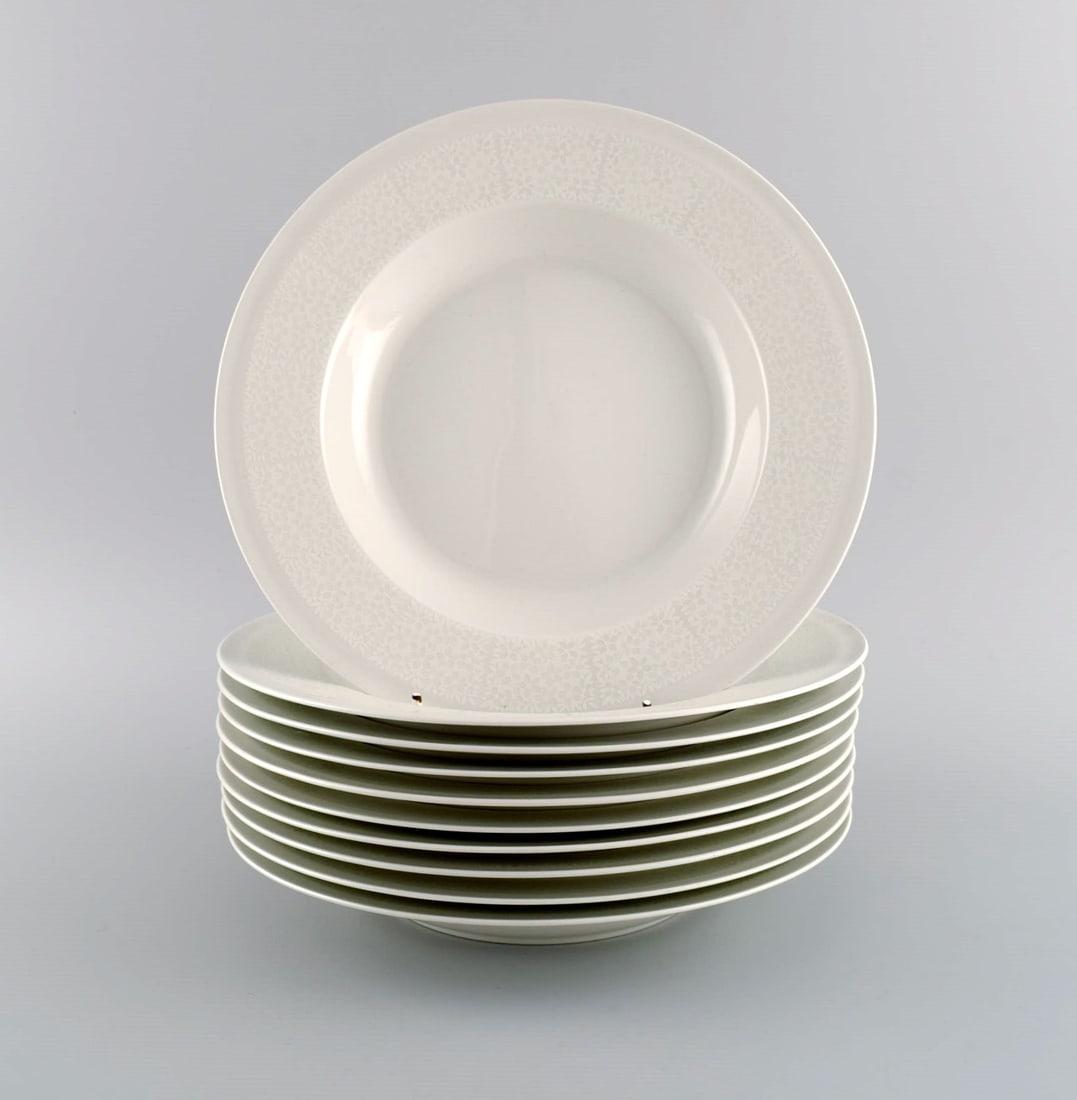 Raija Uosikkinen for Arabia. 10 rare Pitsi deep plates with floral decoration. Dated 1967-1974. - 2