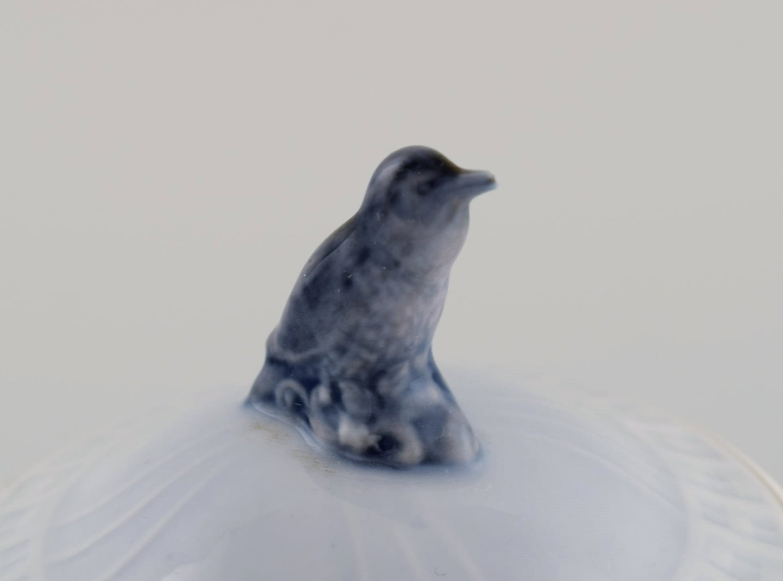 Royal Copenhagen Easter lidded jar in hand-painted porcelain. lid knob modeled as a bird. Dated - 7