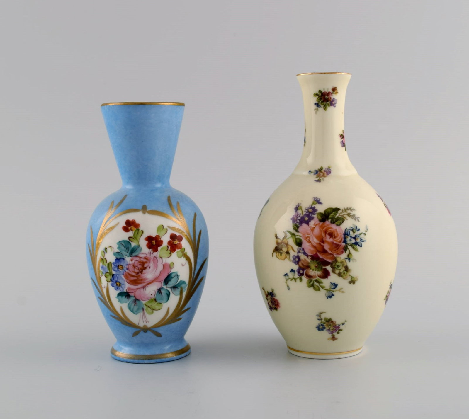 Limoges, France. Two perfume bottles, three vases and lidded box in hand-painted porcelain. Flowers - 3