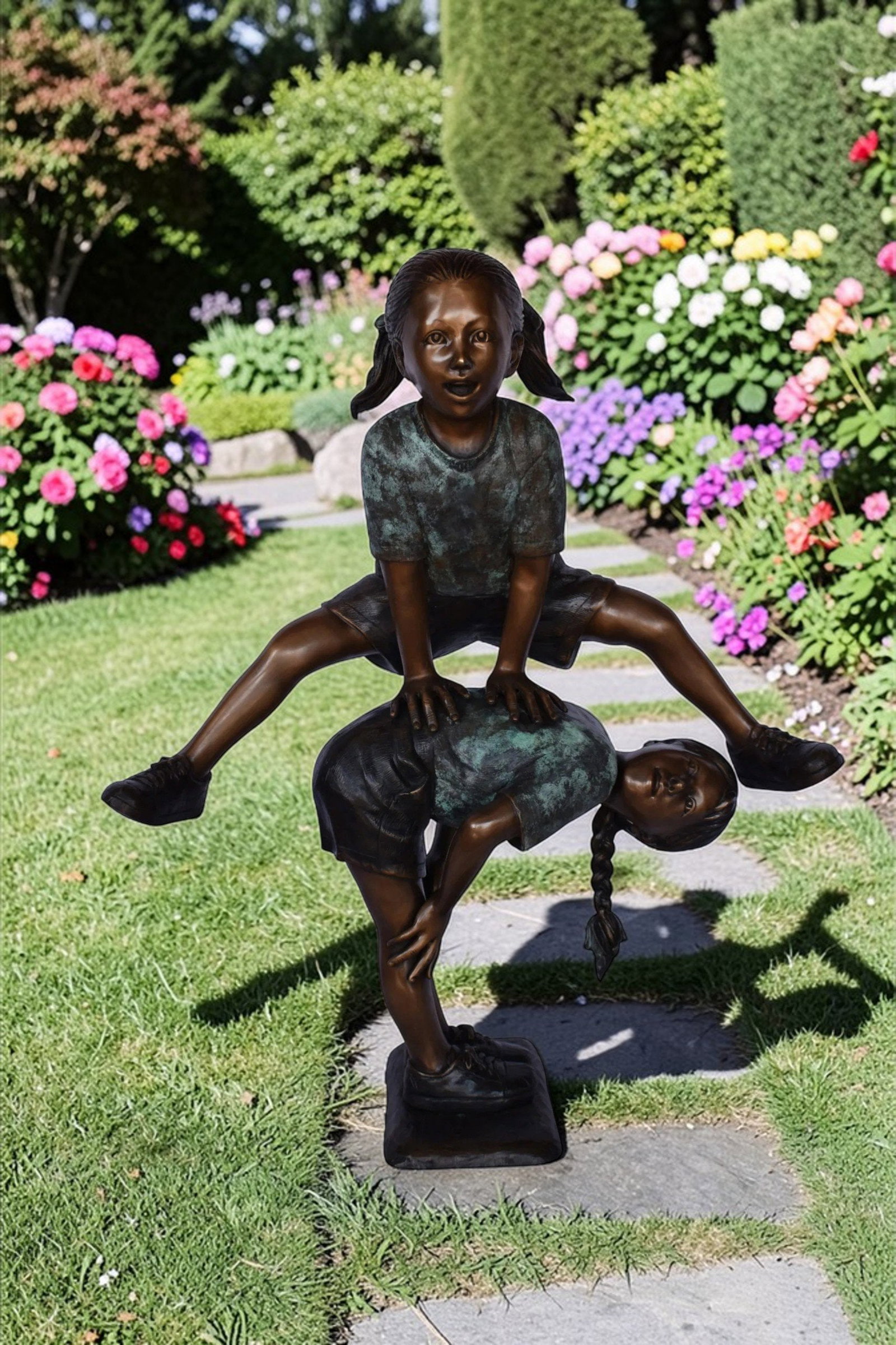 Two Girls Playing Leapfrog Jumping Bronze Statue - Size: 30"L x 14"W x 34"H. - 2