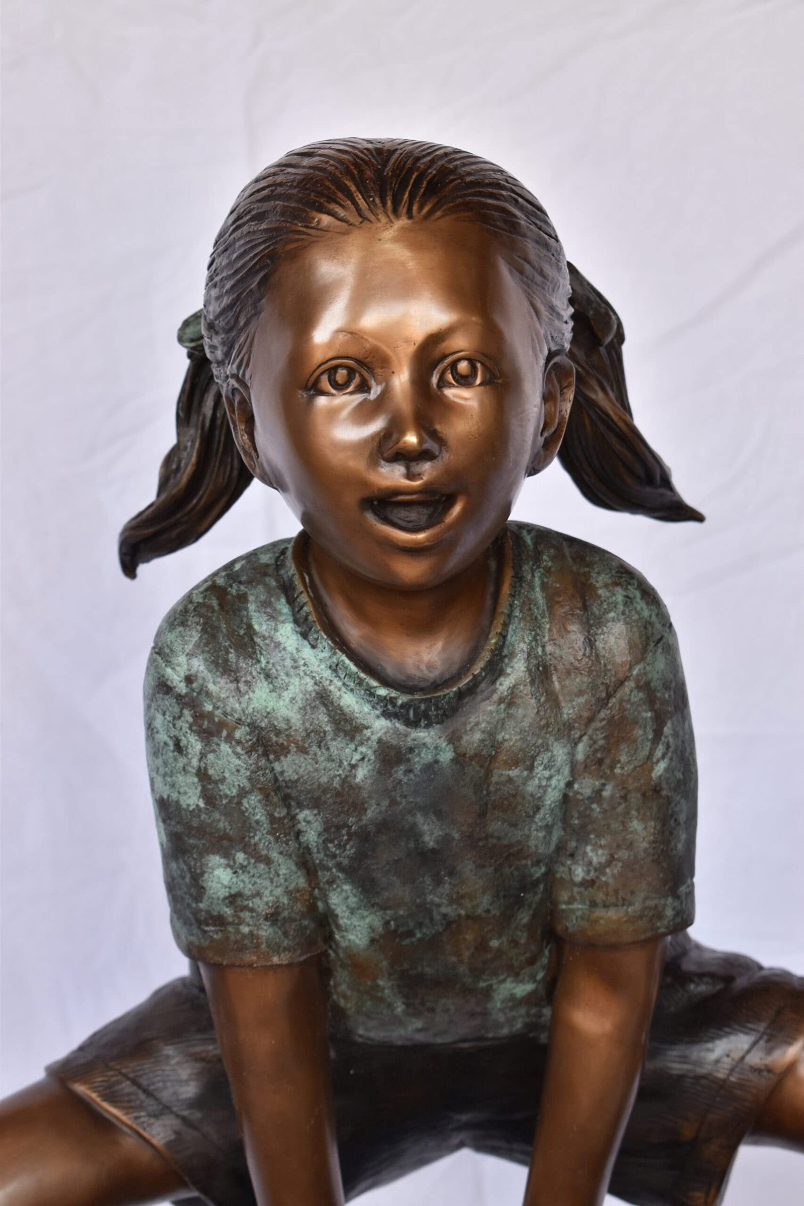 Two Girls Playing Leapfrog Jumping Bronze Statue - Size: 30"L x 14"W x 34"H. - 3