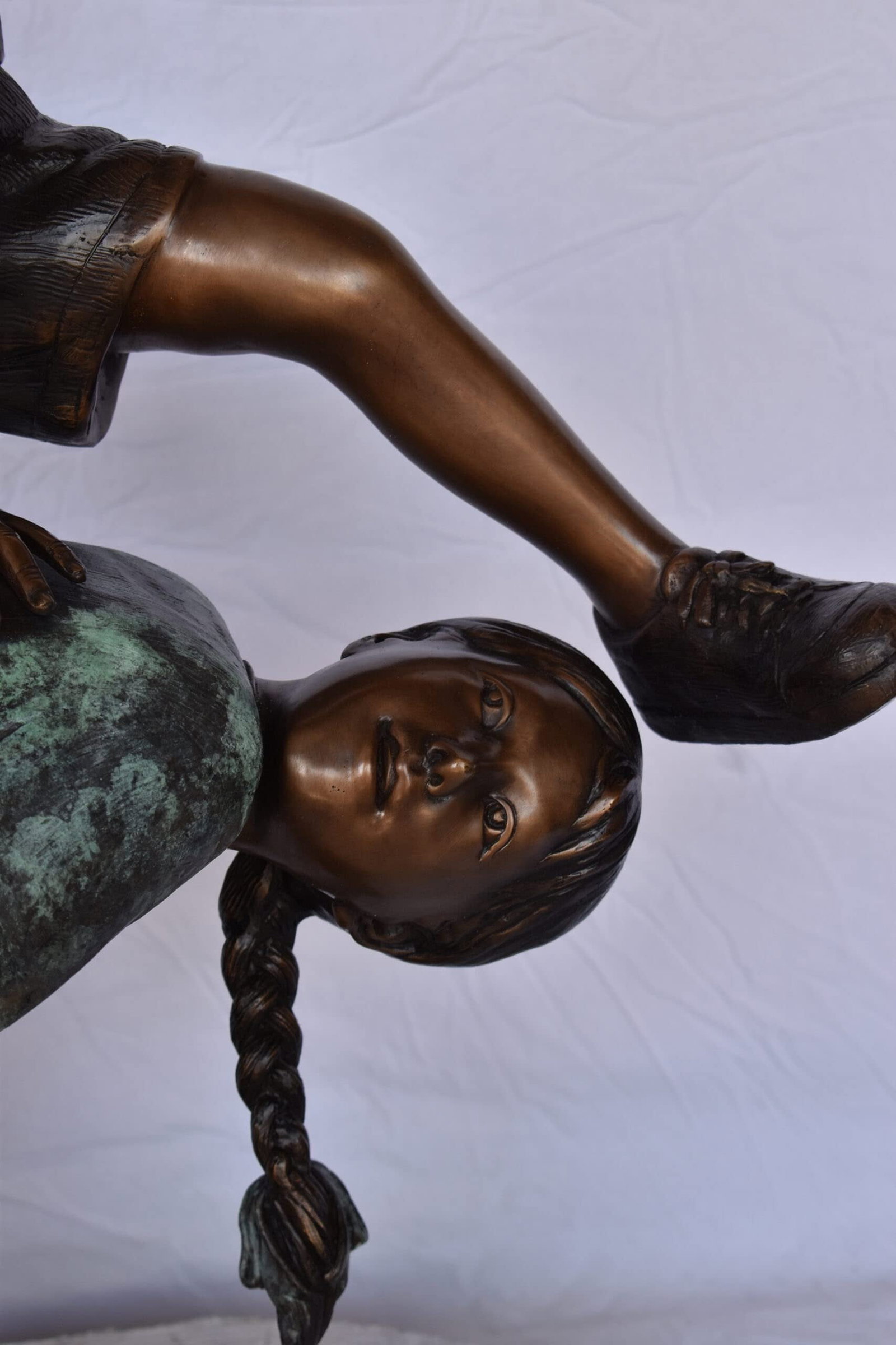 Two Girls Playing Leapfrog Jumping Bronze Statue - Size: 30"L x 14"W x 34"H. - 5