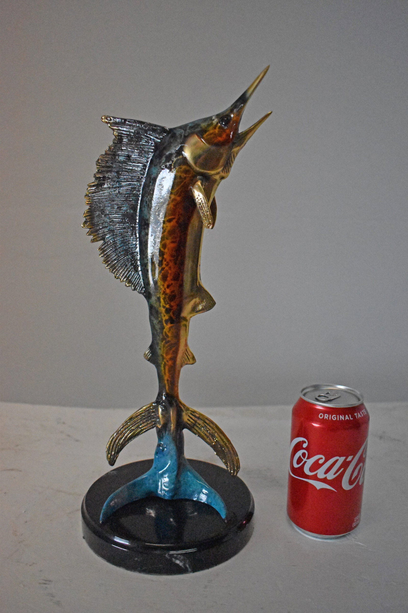 Single Sailfish Bronze Statue Mounted on Round Marble - Size: 6"L x 6"W x 15"H. - 2