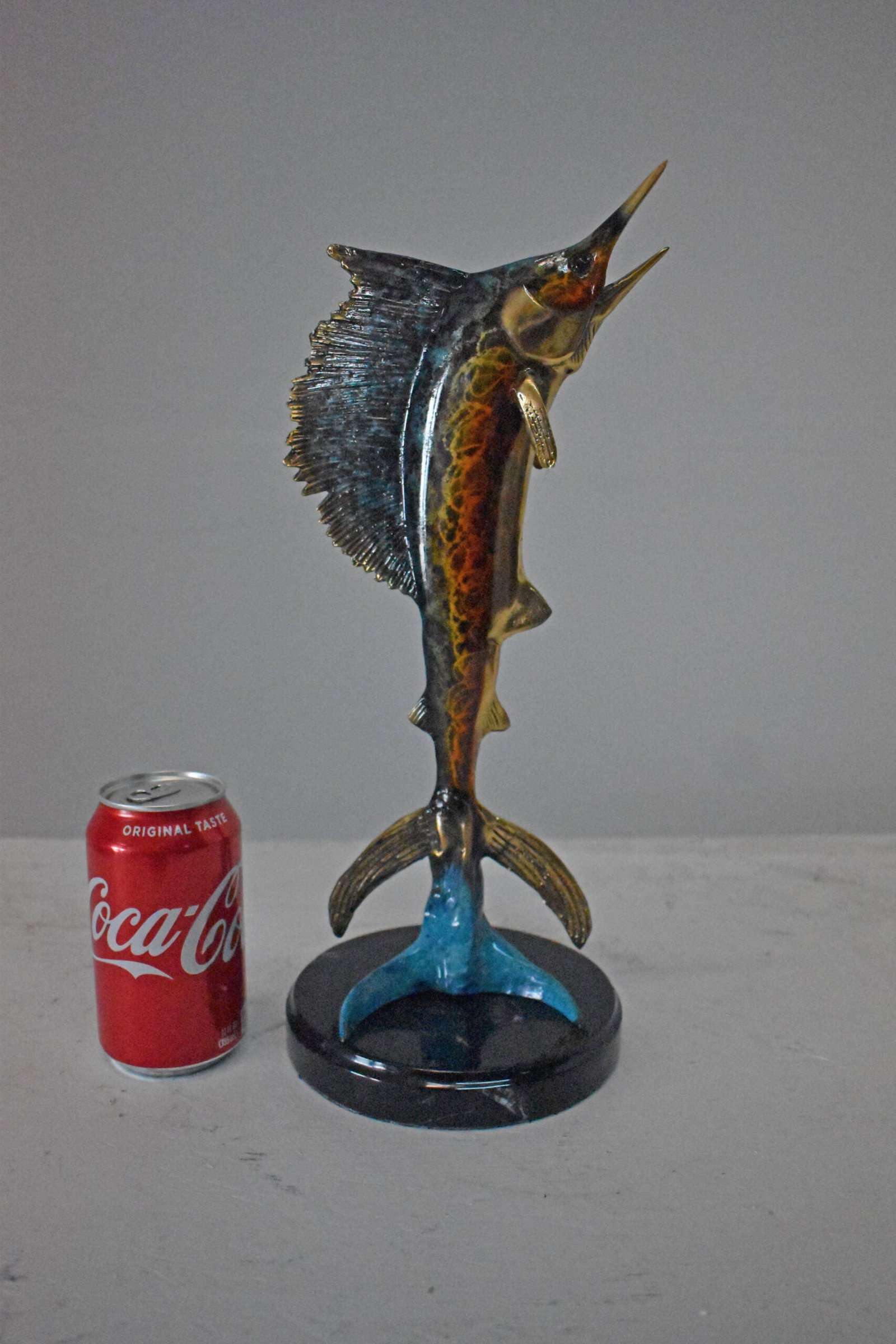 Single Sailfish Bronze Statue Mounted on Round Marble - Size: 6"L x 6"W x 15"H. - 3
