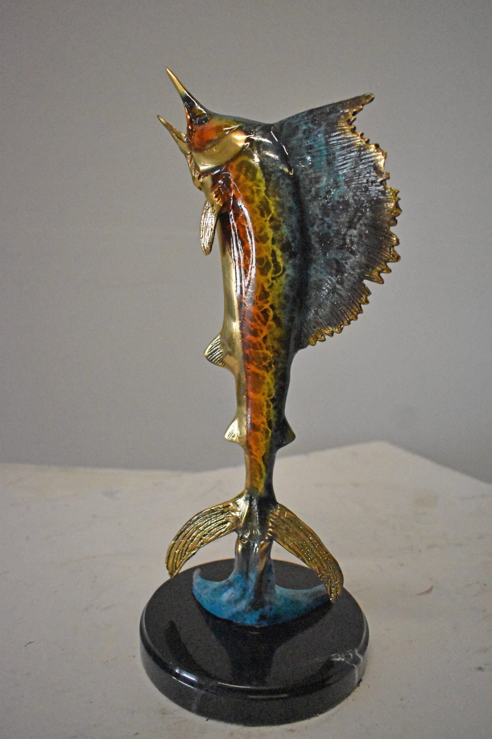 Single Sailfish Bronze Statue Mounted on Round Marble - Size: 6"L x 6"W x 15"H. - 7