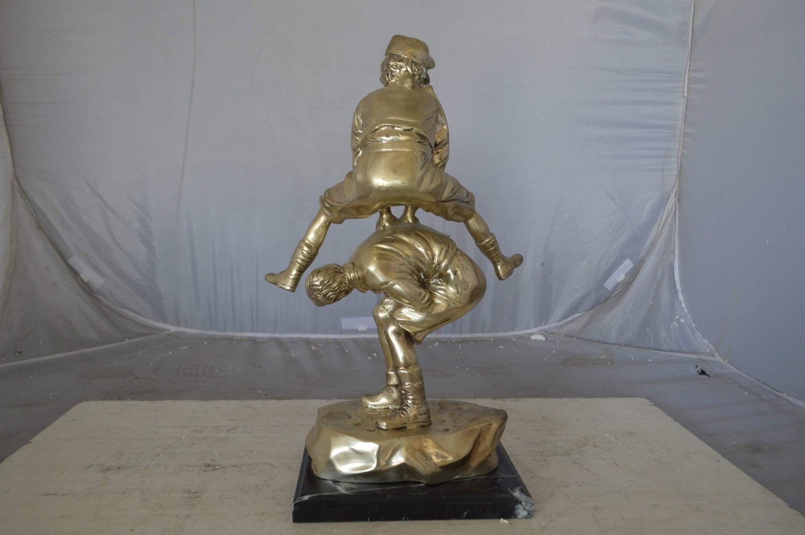 Leapfrog bronze statue silver finish - Size: 12"L x 7"W x 19"H. - 8