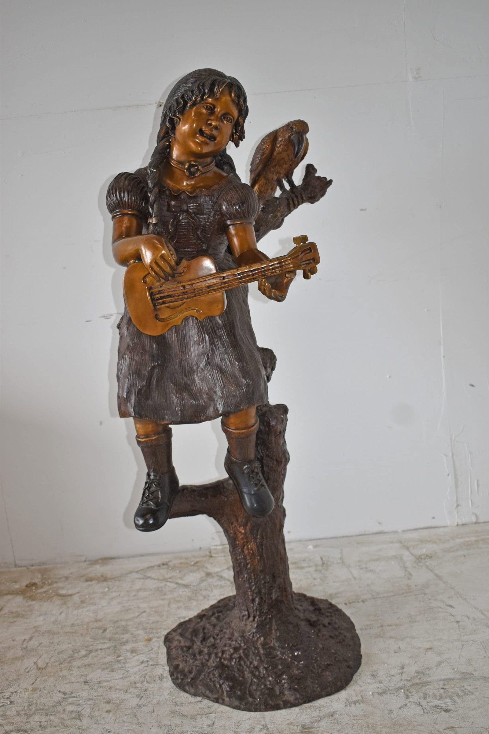 Girl on a Tree Playing the Ukulele with a Parrot Bronze Statue 25" x 23" x 50"H - 4