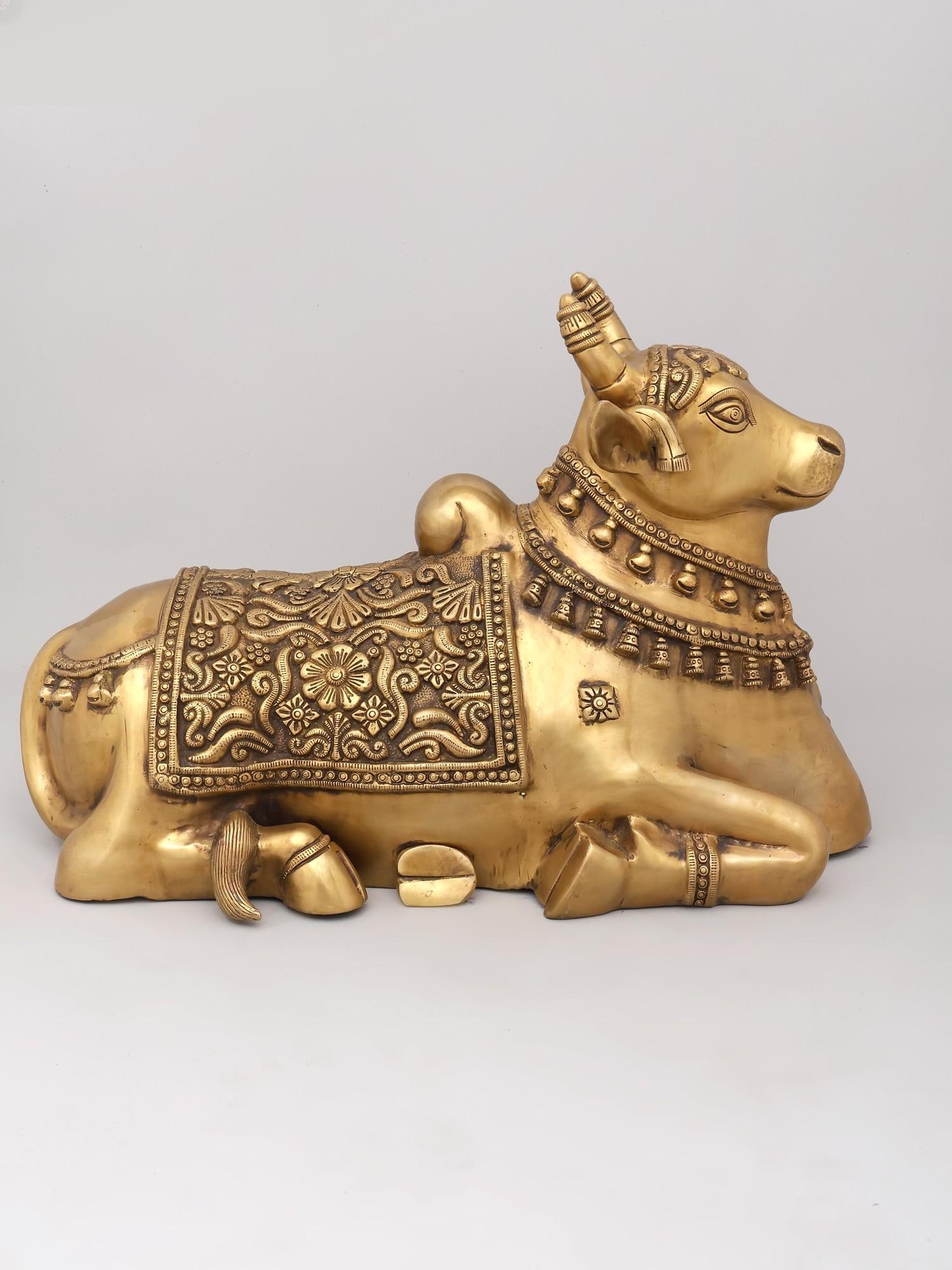 25" Nandi - Vahana of Lord Shiva | Brass Statue | Handmade | Made In India: Title: 25" Nandi - Vahana of Lord Shiva | Brass Statue | Handmade | Made In India Description: 25" Nandi - Vahana of Lord Shiva | Brass Statue | Handmade | Made In India Reserve: $1,708.20 Shipping: D