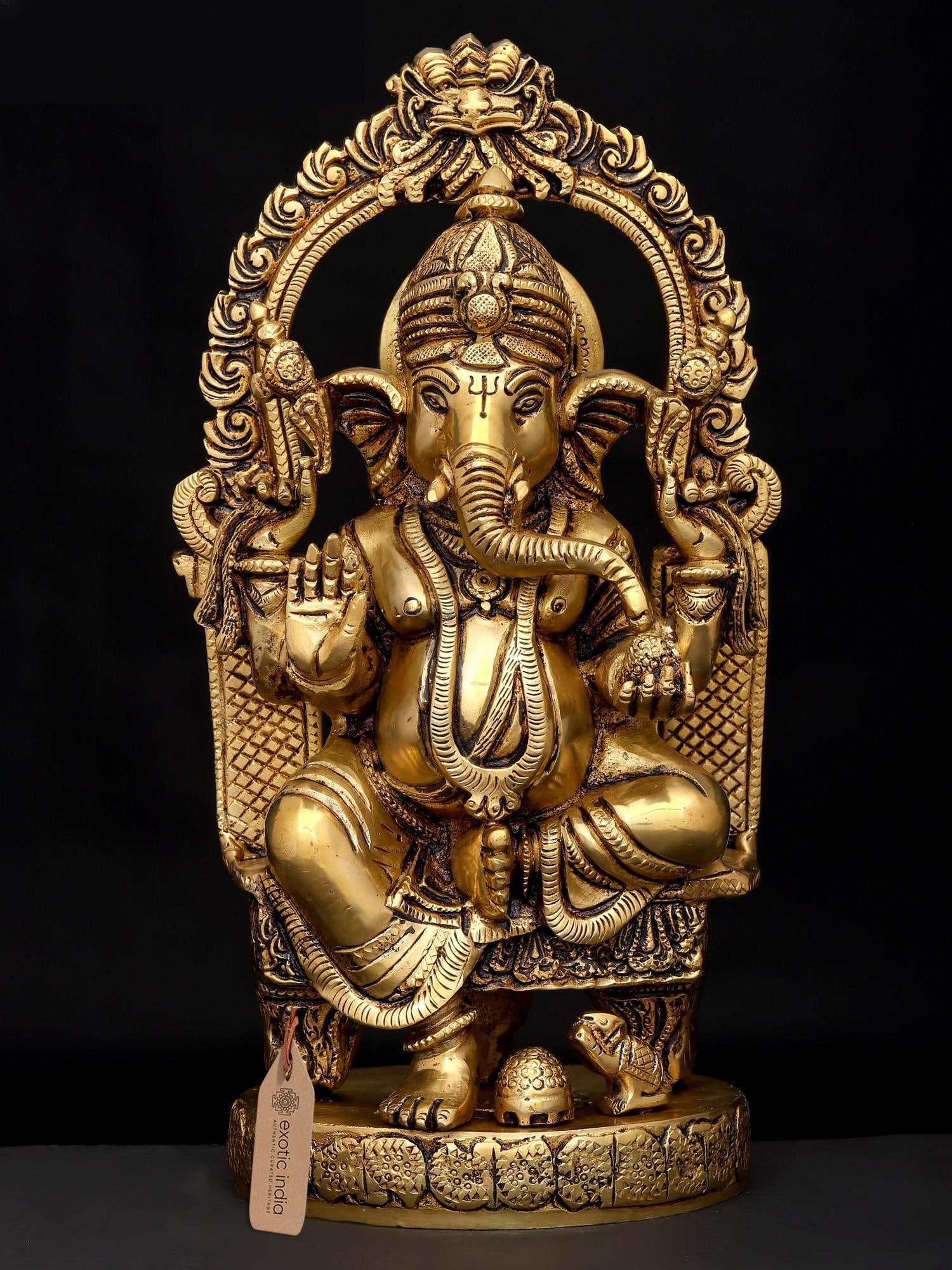 10" Four Armed Blessing Lord Ganesha Seated on Kirtimukha Throne | Brass Statue: Title: 10" Four Armed Blessing Lord Ganesha Seated on Kirtimukha Throne | Brass Statue Description: 10" Four Armed Blessing Lord Ganesha Seated on Kirtimukha Throne | Brass Statue Reserve: $201.60 Shi
