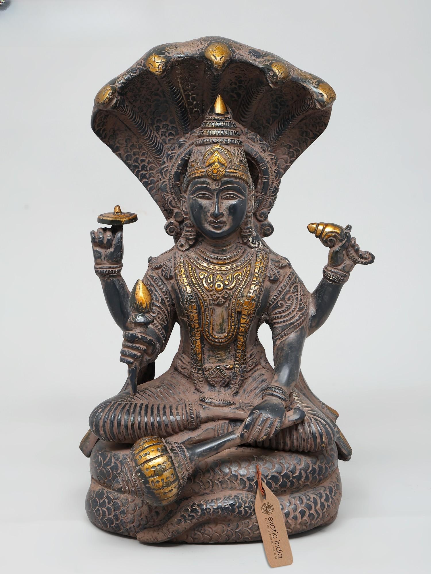 12" Four Armed Lord Vishnu Seated on Sheshnag | Brass Statue | Handmade | Made In India: Title: 12" Four Armed Lord Vishnu Seated on Sheshnag | Brass Statue | Handmade | Made In India Description: 12" Four Armed Lord Vishnu Seated on Sheshnag | Brass Statue | Handmade | Made In India Rese