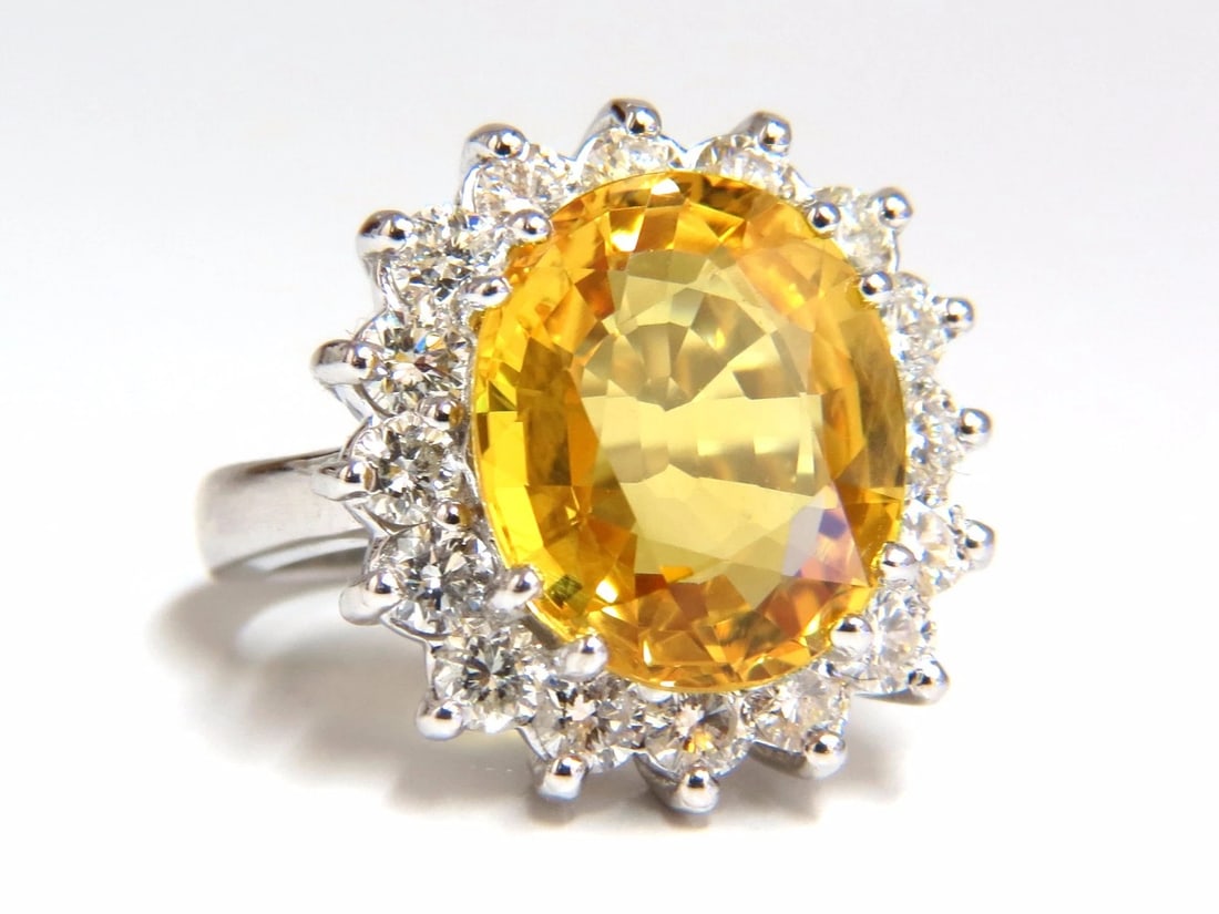 11.81ct Natural Yellow Sapphire diamonds ring 14kt Canary Bright *v: Canary Yellows. 10.01ct Natural Yellow Sapphire Ring Full cut oval brilliant Clean Clarity & Transparent 1.80ct. Diamonds. Rounds Full cuts G-color Vs-2 clarity. 14kt. white gold 10 grams Ring Current