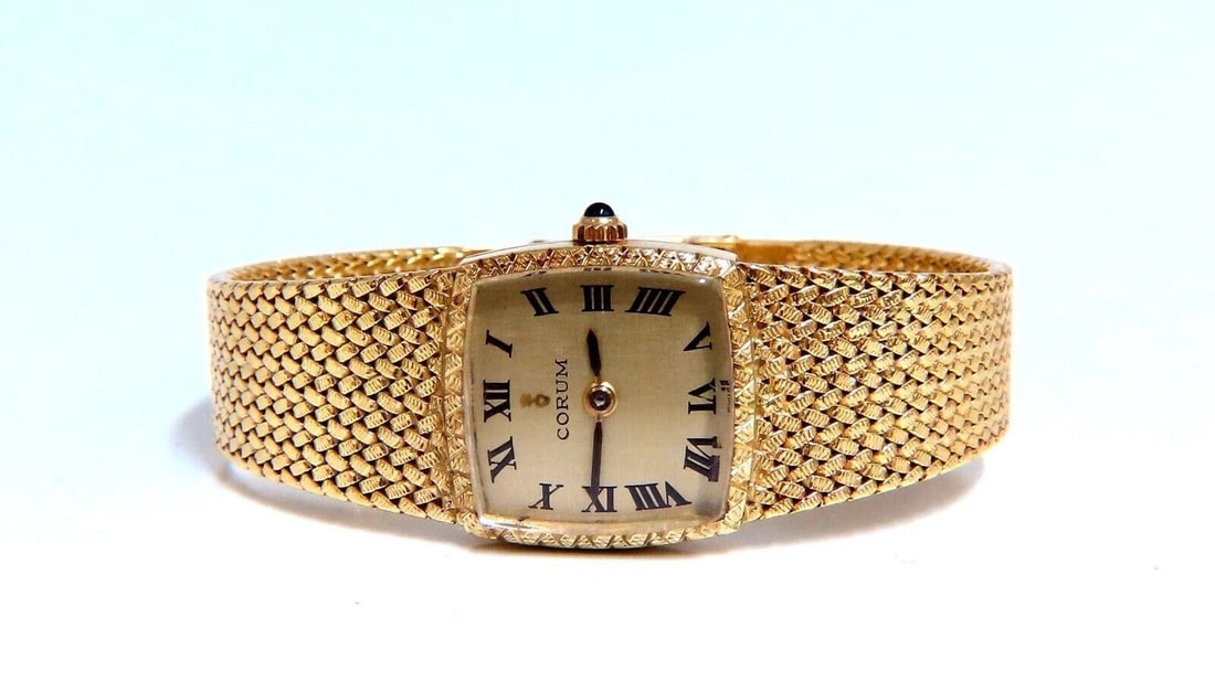 Corum Vintage Gold Watch 18kt 6.5 inch**: Corum Vintage Gold Watch 18kt 6.5 inch $9,000.00 PRODUCT DESCRIPTION Corum Vintage Watch is in working condition good condition overall gorgeous band deco casing of watch is: 18mm x 18