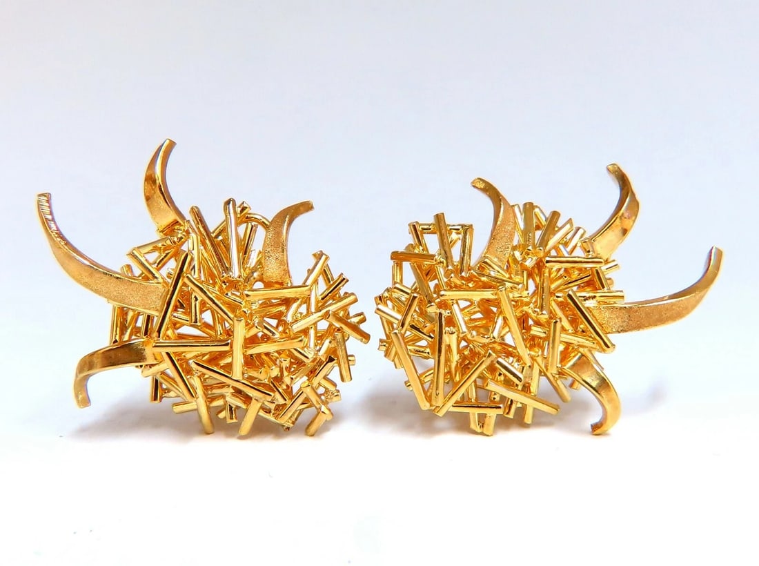 Modern Flaming Fused Stick 3D Handmade Clip On Earrings 18 Karat**: Modern Fused Sticks Clip Earrings Textured clip on Measurements of Earrings: Diameter: 1.1 x .92 inch Depth: .25 inch 17.6 grams / 18kt. yellow gold Earrings are gorgeous made Free Insured overnight s