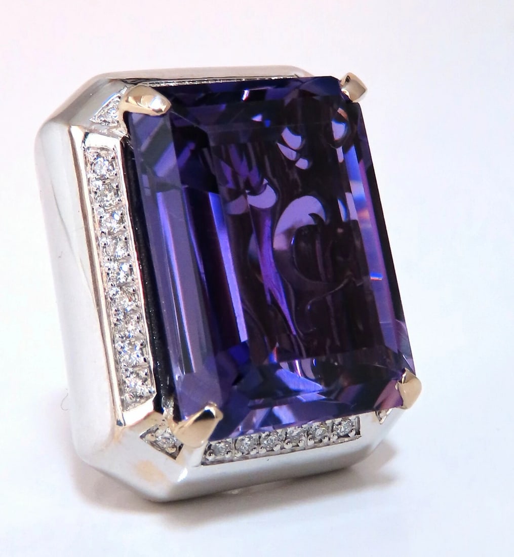 37.23Ct Natural Amethyst Diamond Ring 18 Karat Cocktail Cluster *v: Amethyst Halo Domed Cluster Ring 37.23t. Brilliant Natural Amethyst Emerald Cut Clean VVS Clarity Beautiful purple sparkles throughout Transparency A+ 24.8 x 18mm Side natural diamonds total: .50ct. B
