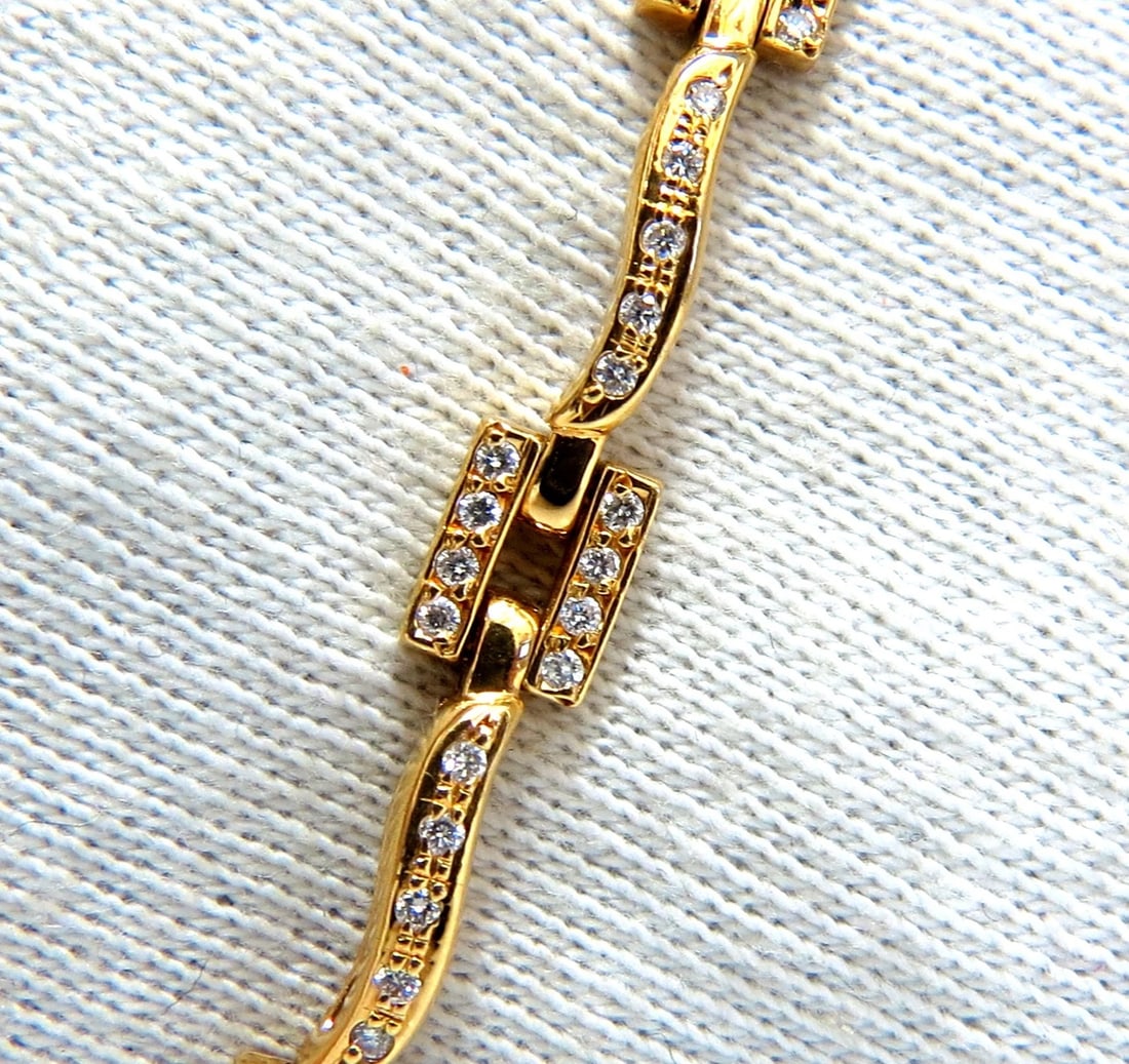18kt Diamonds Bead set Vine bracelet 1.30ct**: Vine link diamonds tennis bracelet. Bead Set 1.00ct. natural diamonds. Rounds, Full cut brilliants H colors Si-1 clarity. 18kt. yellow gold 12 Grams. 7.5 Inches long (wearable length) 5.6mm wide press