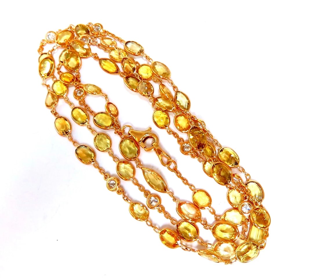 27ct fancy vivid yellow Sapphire diamonds station yard necklace 14 karat **: Fancy yellow color natural sapphires diamonds yard station necklace. Oval, emerald cut, marquise, and pear shape sapphires. Average 4x5 mm Clean clarity transparent Excellent cuts. .70 carat natural