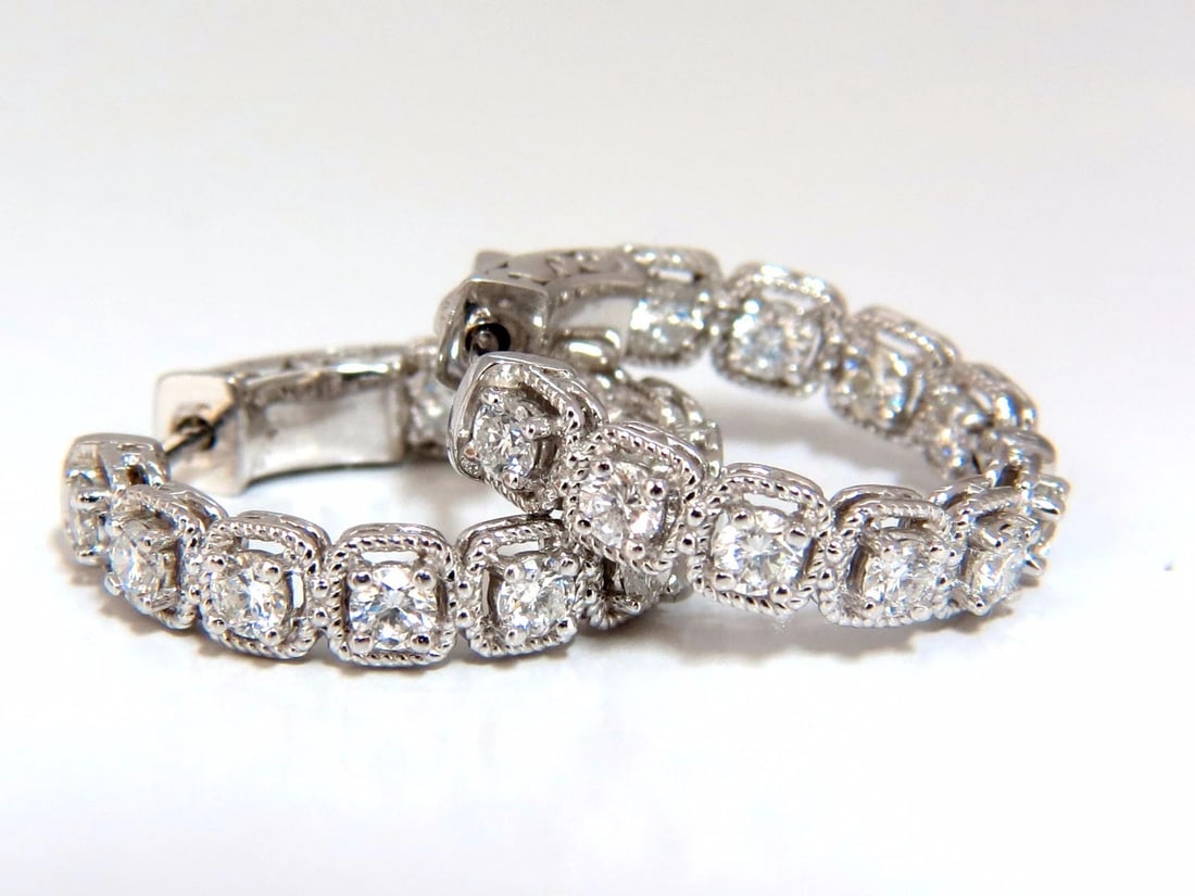 1.60ct natural round brilliant in/out diamond hoop earrings 14kt rope twist**: Rope twist outer, Modern, In & Out. 1.60ct. Natural Round, Brilliant diamonds hoop earrings. inside / out G color, VS-2 clarity Full cuts, great sparkle. .87 inch in diameter 4.4 mm wide 7 grams. 14kt