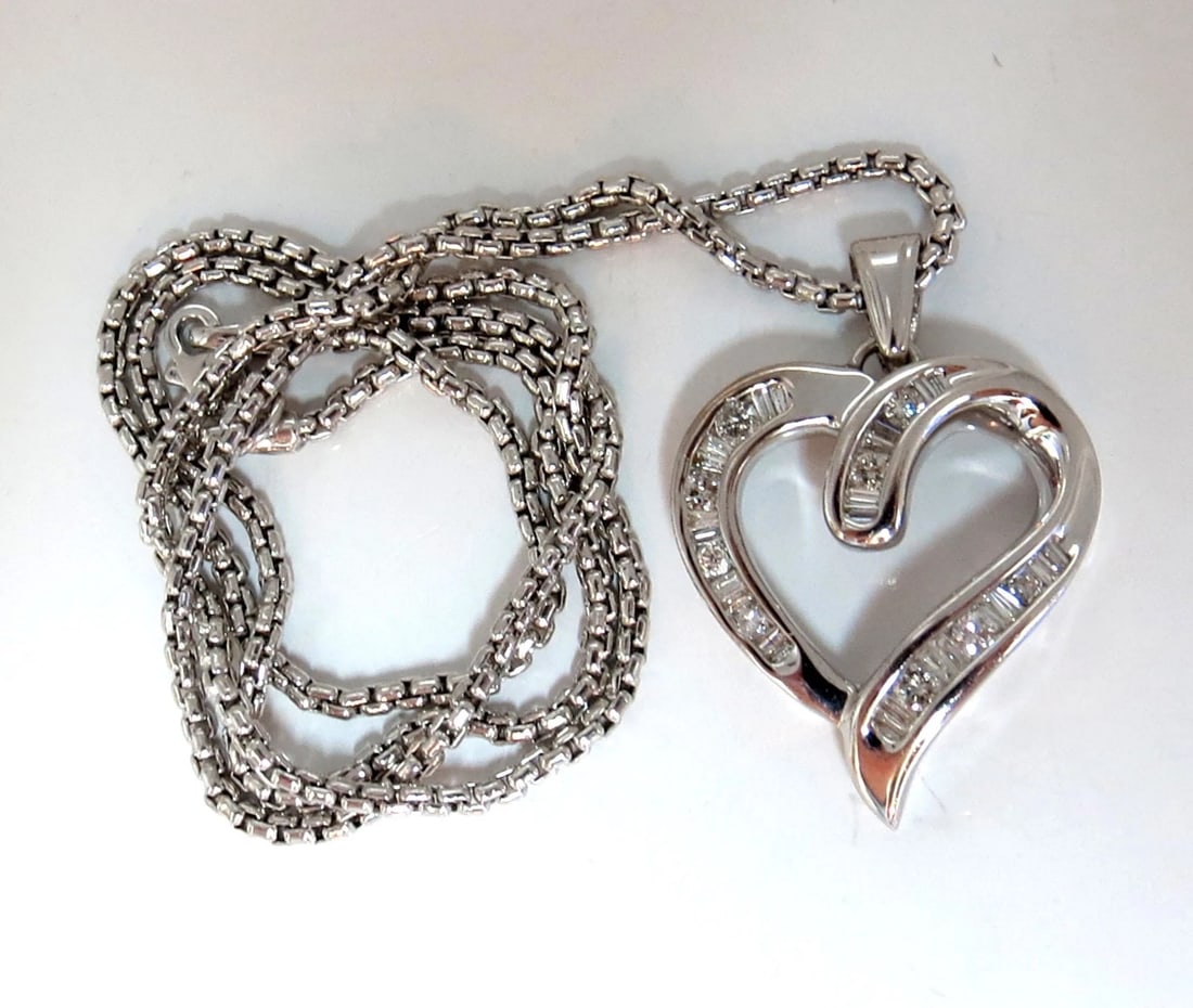 .50ct Open Heart Rounds & Baguettes Diamond Necklace 14 karat**: .50ct diamonds heart necklace. H-color vs-2 clarity. 14kt. white gold .item: 8.7gms. $1200 Open Heart Necklace .50ct. diamonds Rounds & Baguettes Full cut and Brilliant H-color, Vs-2 clarity