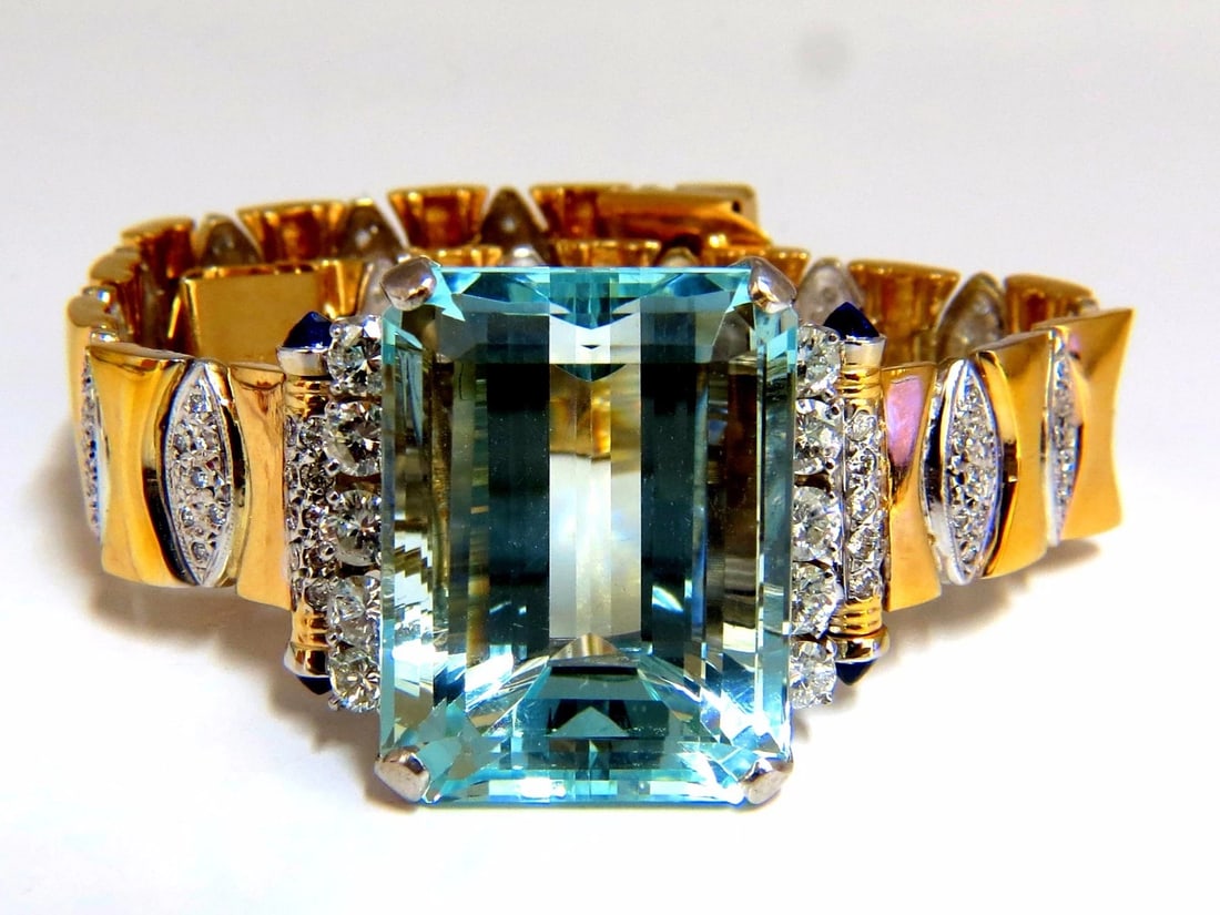 GIA Certified 56.05ct natural aquamarine diamonds bracelet Bohemian Deco 14kt **: Bohemian Raised Solitaire, elegant. 52.25ct. Natural Aquamarine Bracelet Vivid Aqua Blue, Transparent & round cut. Clean VS Clarity 25.61 x 19.47 x 13.86mm diameter GIA Report: 2175093327 (to ac