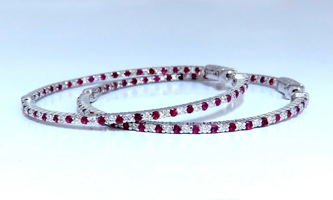 2.40ct natural Ruby diamonds hoop earrings 14kt white gold inside out 11579**: Inside/out natural Ruby and Diamond hoop earrings. 1.64ct. round rubies, full brilliant cut clean clarity and transparent .76ct. natural round diamonds G color vs2 clarity. 14 karat white gold 12.2 gr