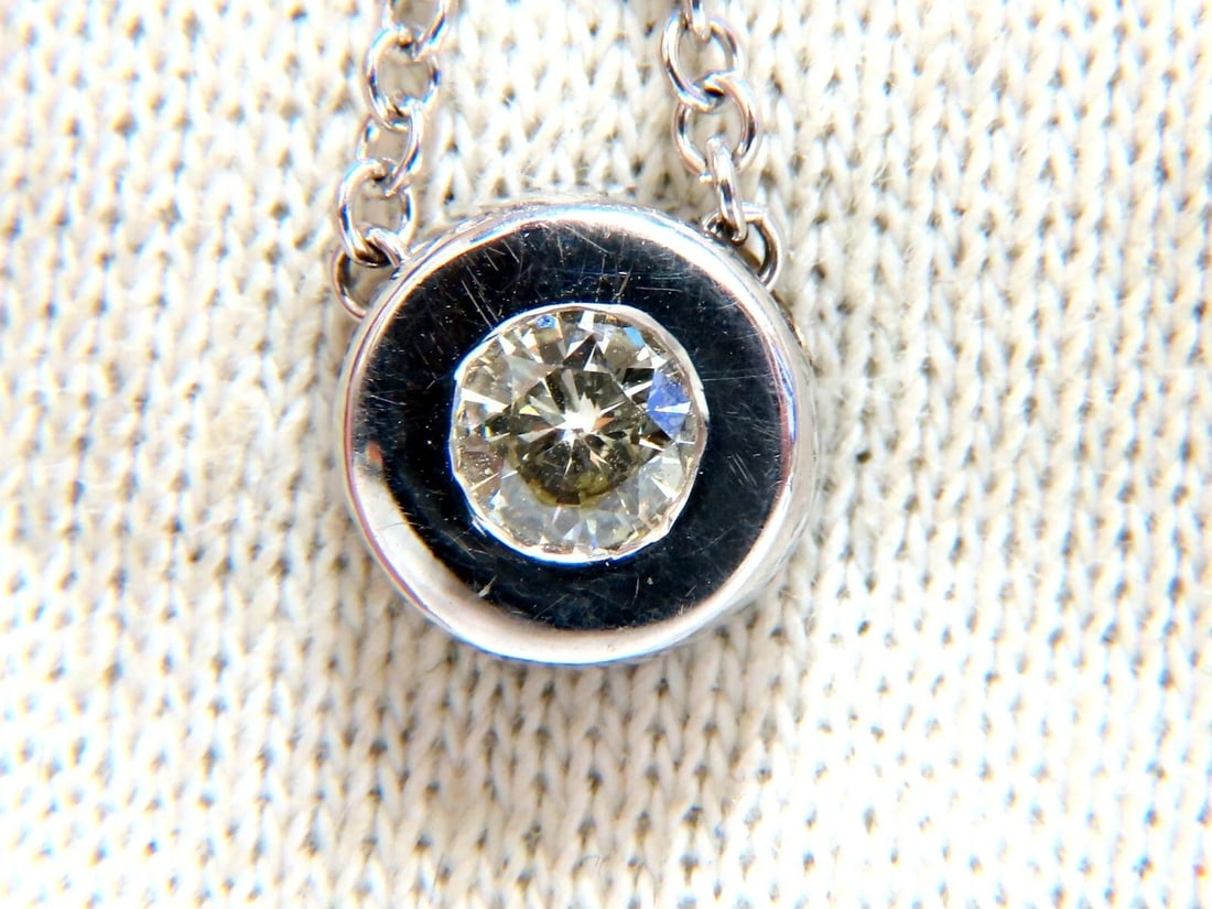 .35ct natural round brilliant diamond solitaire necklace 15.75 inch 14k **: Classic Solitaire Flush set within casing .35ct. round diamond Full cut brilliant Si-1 Clarity. Fancy Very Light Yellow 14kt. white gold. Necklace: 15.5 inches. 4.1 grams. Diameter of Diamond