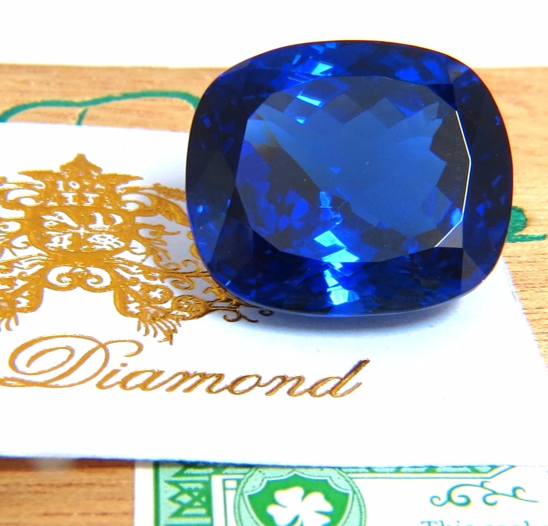 GIA Certified 62.60ct Natural Blue Cushion Cut Tanzanite Magnificent+: MAGNIFICENT JEWELS Please be sure to visit all our listed items. Tanzanite Royale. GIA CERTIFIED 62.60ct. Natural Tanzanite Clean VVS Clarity Cushion Cut Full transparency Classic vivid blue color 24.