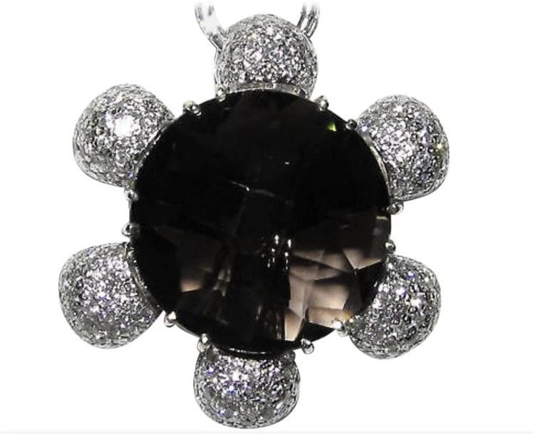 18 Karat 12.50 Carat Checkerboard Topaz Diamond Necklace**: 18 Karat 12.50 Carat Checkerboard Topaz Diamond Necklace $2,500.00 PRODUCT DESCRIPTION Classic Sunflower 10.00ct Natural Checkerboard cut Topaz 2.50ct. diamonds G-color, Vs-2 clarity 18
