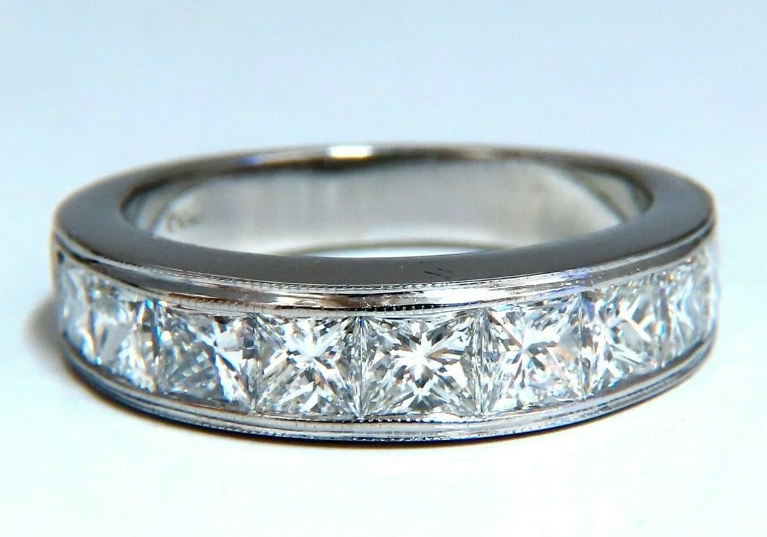 2.30ct Natural Princess Cut Diamonds Channel Band Platinum Ring *v: MAGNIFICENT JEWELS 2.30ct. Natural Princess Cut Diamonds band H color / Vs-2 clarity Channel Set 8.6 grams Size 6.75 and may resize. 5.3mm thick 3.9mm depth Platinum $11000 Appraisal to accompa
