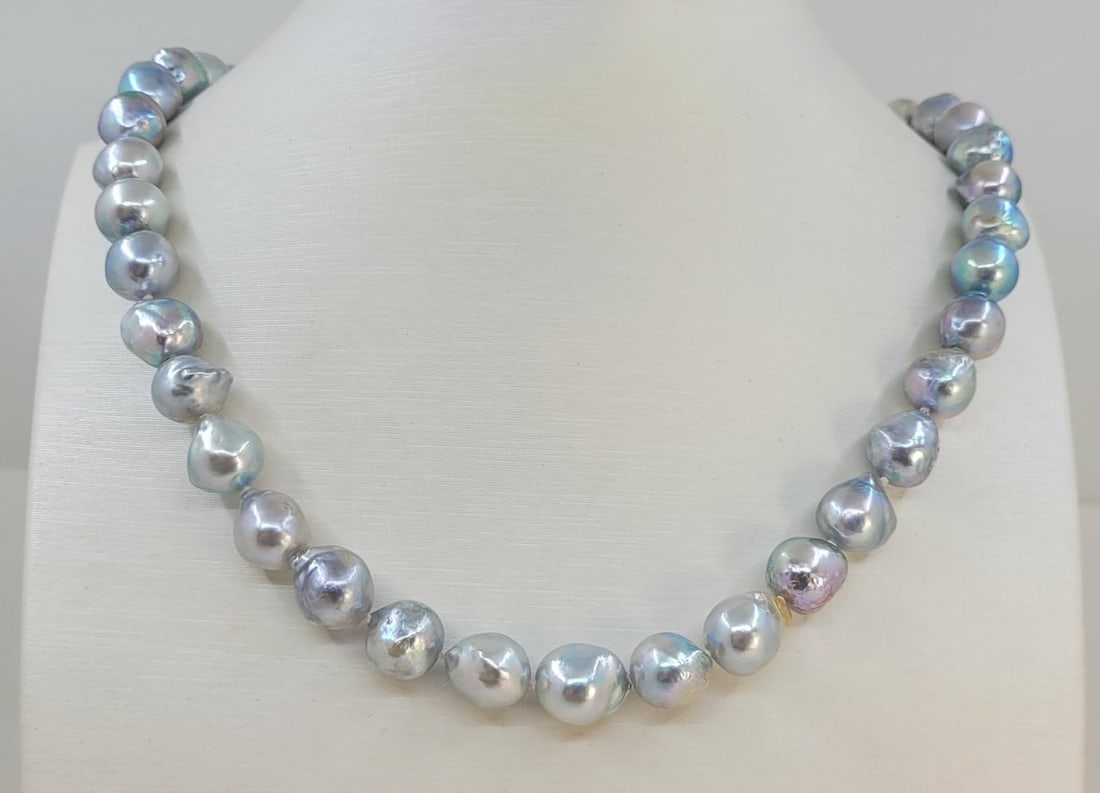 Necklace 10x11mm Silvery Akoya Pearls: Title: Necklace 10x11mm Silvery Akoya Pearls Description: A beautiful pearl necklace of silvery saltwater Akoya pearls with exceptional lustre, finished with a ball clasp in solid silver. The classic