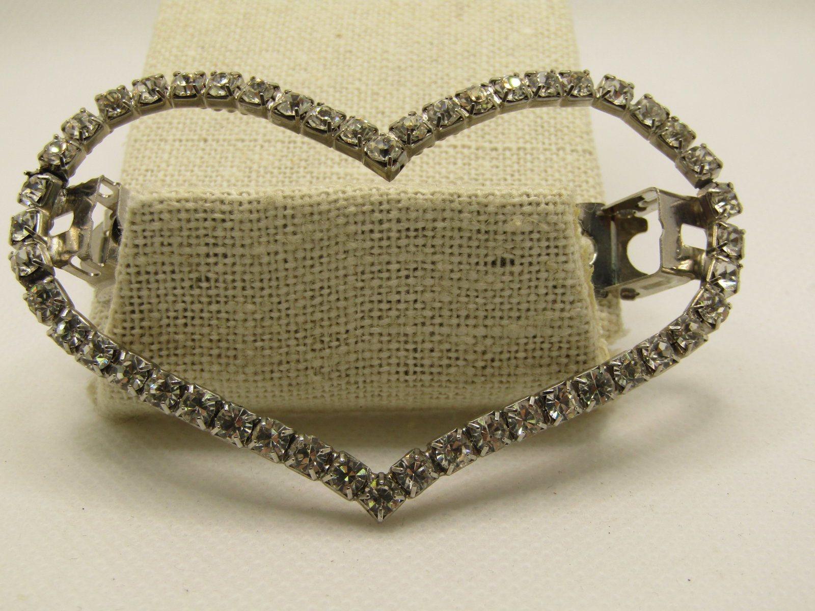 Vintage Rhinestone Open Heart Barrette, 3" by 2.75", Silver Tone: Title: Vintage Rhinestone Open Heart Barrette, 3" by 2.75", Silver Tone Description: Vintage Rhinestone Open Heart Barrette, 3" by 2.75", Silver Tone. All clear rhinestones creating a heart halo.