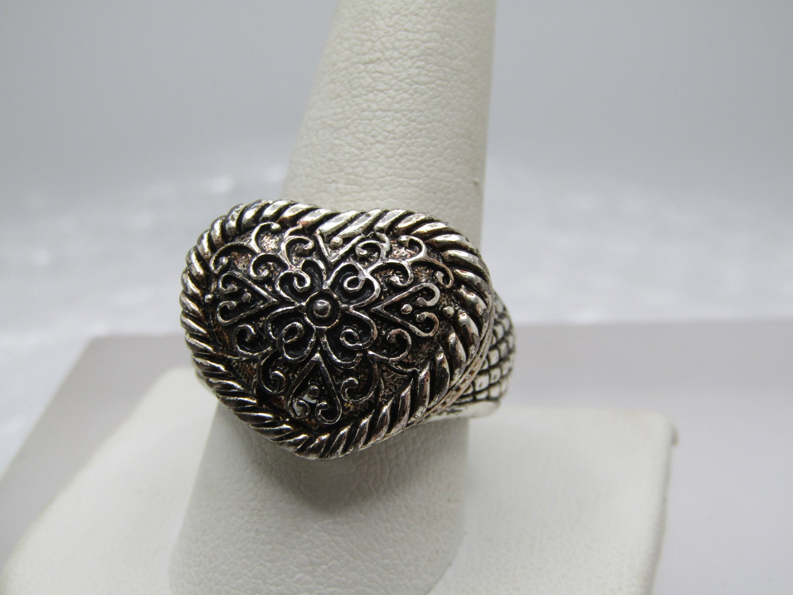 Sterling Statement Heart Ring, Sz. 10.5, Scrolled, 1990's: Title: Sterling Statement Heart Ring, Sz. 10.5, Scrolled, 1990's Description: Sterling Statement Heart Ring, Sz. 10.5, Scrolled, 1990's. This is a large domed scrolled heart ring that is appx. 22.5mm 