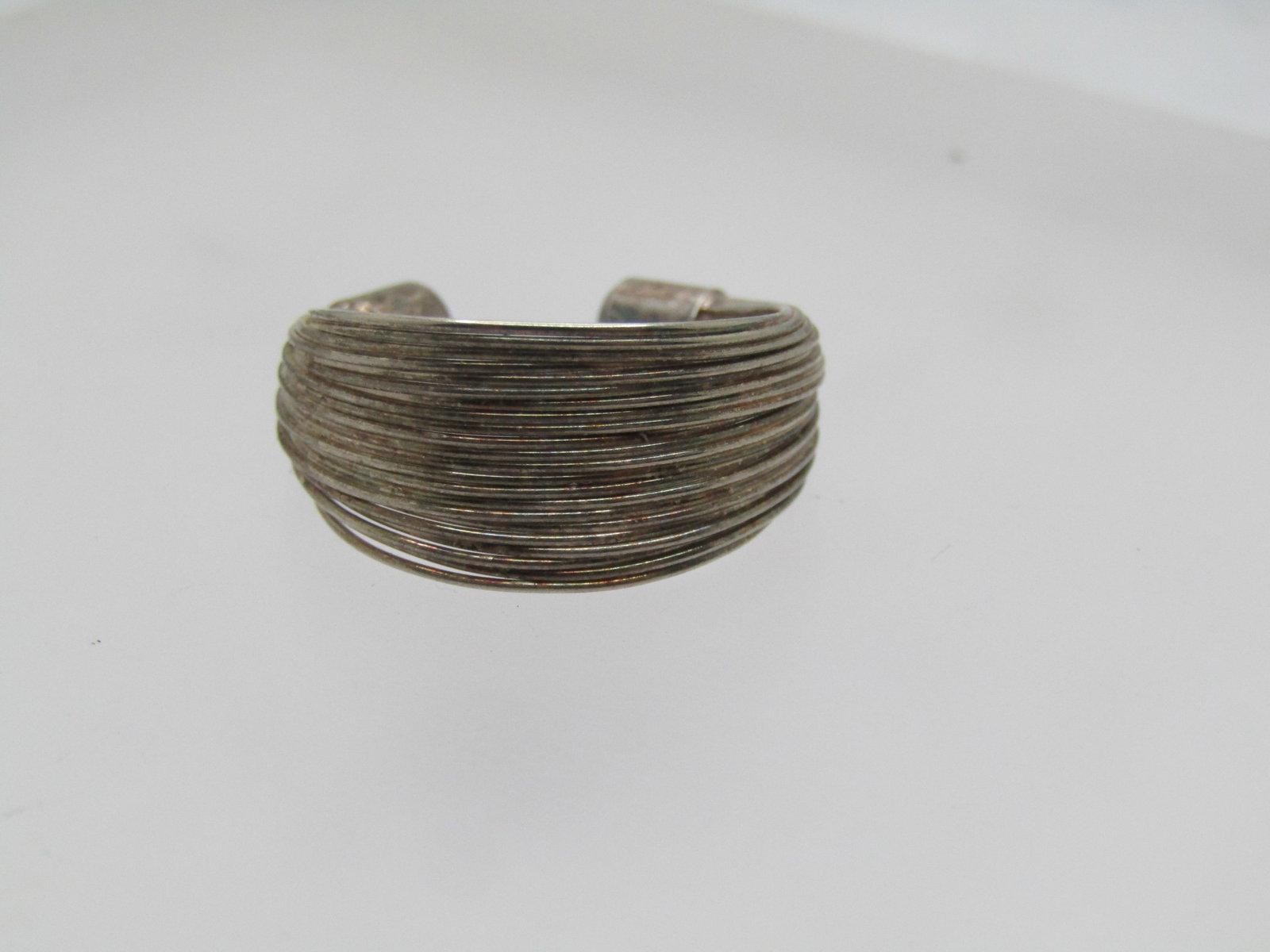 Vintage Silver Wide Wired Band Ring, Toe Ring, Sz. 4 and up: Title: Vintage Silver Wide Wired Band Ring, Toe Ring, Sz. 4 and up Description: Vintage Silver Wide Wired Band Ring, Toe Ring, Sz. 4 and up. The ring is made up of many silcan be worn on fingers too. 