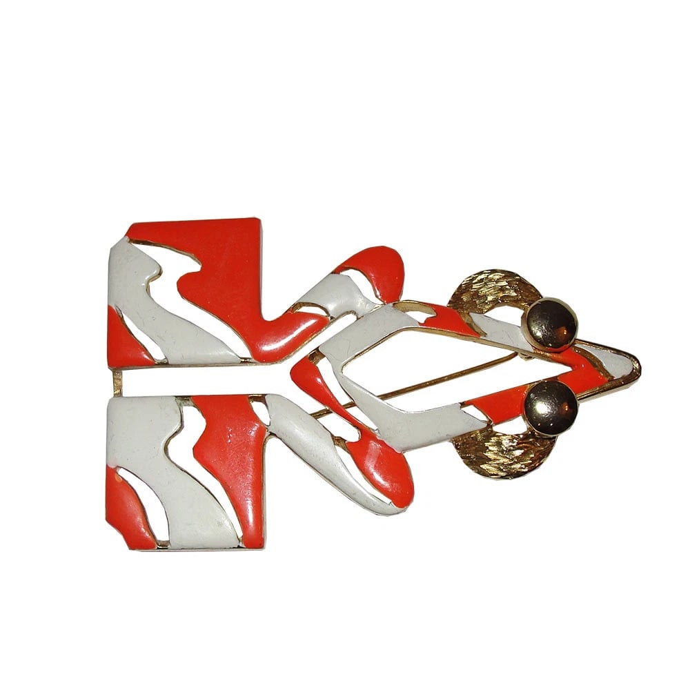Pierre Cardin Enamel Runway Frog Pin: Title:Pierre Cardin Enamel Runway Frog Pin Description:Rare and unique Pierre Cardin Enamel orange and white Runway frog pin, pin is 18 kt gold plated over base metal. Circa 1960's. Measures 3 1/2" lo