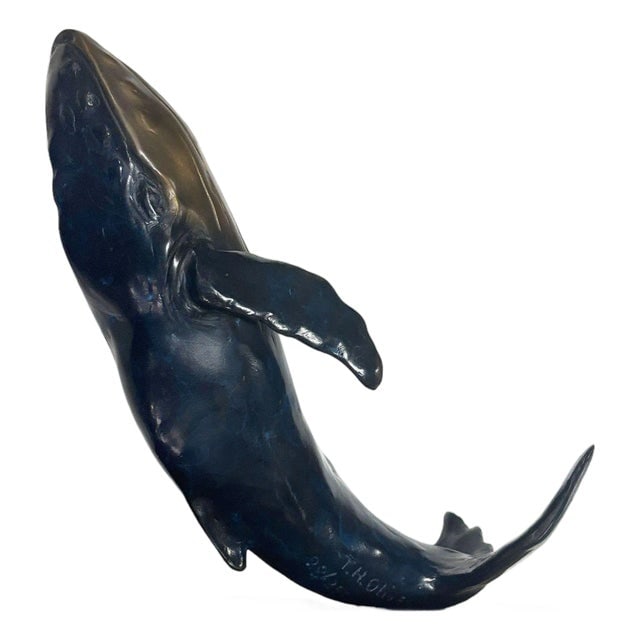 1980s Hand Casted Humpback Whale Bronze Sculpture Mounted on Stand by t.h. Oliver: Title: 1980s Hand Casted Humpback Whale Bronze Sculpture Mounted on Stand by t.h. Oliver Description: Elegant bronze whale sculpture mounted on a polished oak wooden base. The whale rises gracefully, 