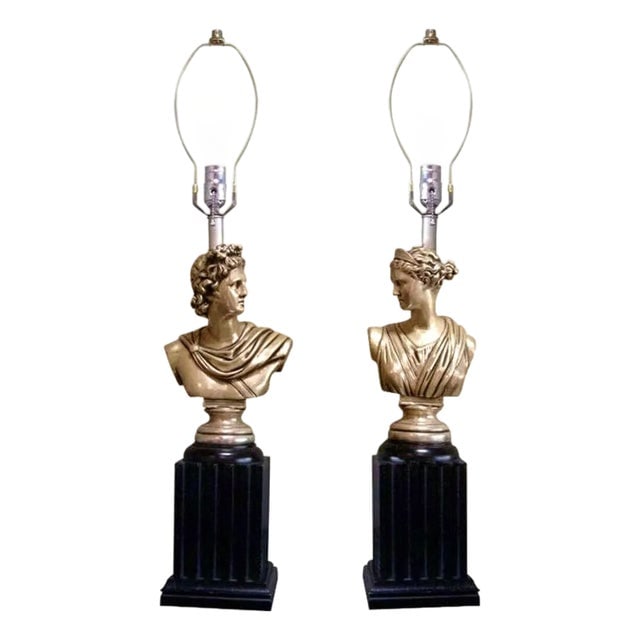 1950s Mid Century Modern High Style Hollywood Regency God & Goddess Pillar Table Lamps - a Pair: Title: 1950s Mid Century Modern High Style Hollywood Regency God & Goddess Pillar Table Lamps - a Pair Description: This pair of 1950s Neoclassical-style table lamps features the busts of Greek gods m