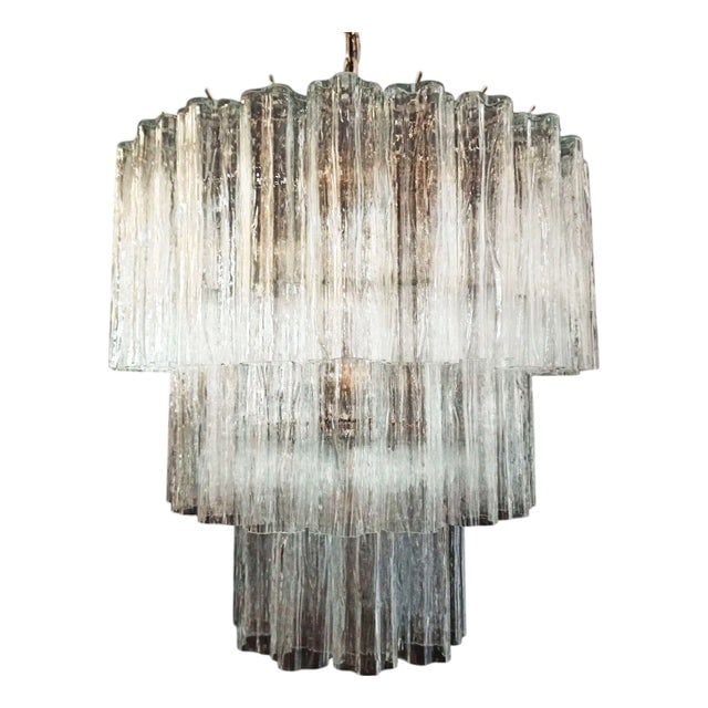 1960s Mid-Century Murano Glass Tronchi Pendant Chandelier by Venini: Title: 1960s Mid-Century Murano Glass Tronchi Pendant Chandelier by Venini Description: Made in Italy, this gorgeous round chandelier features a brass frame and three tiers of textured glass pendants,