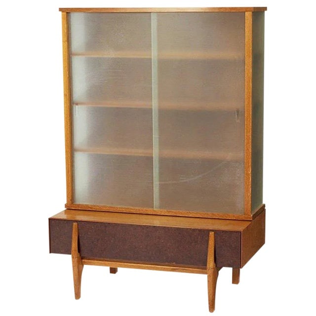 John Keal Wall Unit / Vitrine With Drawers for Brown Saltman: Title: John Keal Wall Unit / Vitrine With Drawers for Brown Saltman Description: This versatile Mid-Century Modern vitrine / wall unit designed by John Keal for Brown Saltman features four shelves beh