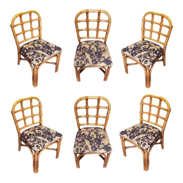 1950s Restored Rattan Dining Chairs Set With Tic-Tac-Toe Back-Set of 6: Title: 1950s Restored Rattan Dining Chairs Set With Tic-Tac-Toe Back-Set of 6 Description: Restored rattan dining side chairs with Tic-Tac-Toe grid back and vintage tropical floral seat. 1950, United 