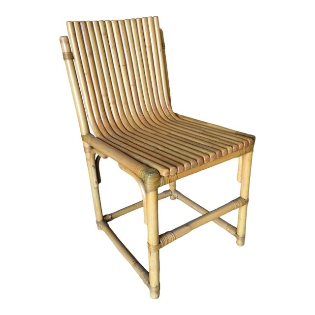 Restored Modernist Rattan Vertically Stacked Side Chair: Title: Restored Modernist Rattan Vertically Stacked Side Chair Description: Rare vertically stacked rattan side chair designed in the style of Paul Frankl. This unique design has 15 vertically stacked