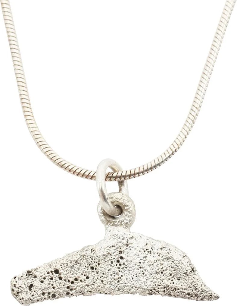 GREEK/UKRAINE BRONZE DOLPHIN PENDANT NECKLACE, 5TH-4TH CENTURY BC: From the Greek Black Sea colony of Olbia which provided slaves, cereal, and fish. Before die struck coinage, these dolphin figures served as a means of exchange, vital for commerce to thrive. They are