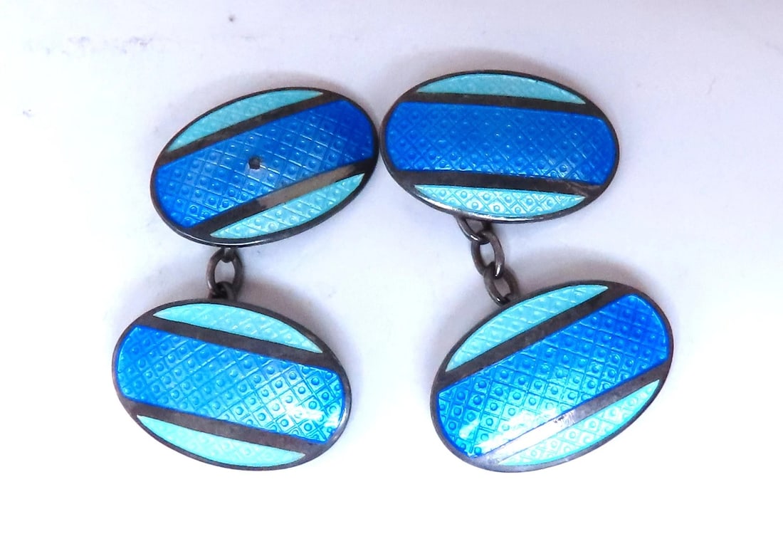 Vintage BGM Sterling Silver Enamel Cufflinks 12480**: Title: Vintage BGM Sterling Silver Enamel Cufflinks 12480** Description: Vintage BGM Sterling Silver Enamel Cufflinks 12480** $200.00 PRODUCT DESCRIPTION turquoise and ocean blue stripe enamel cufflin