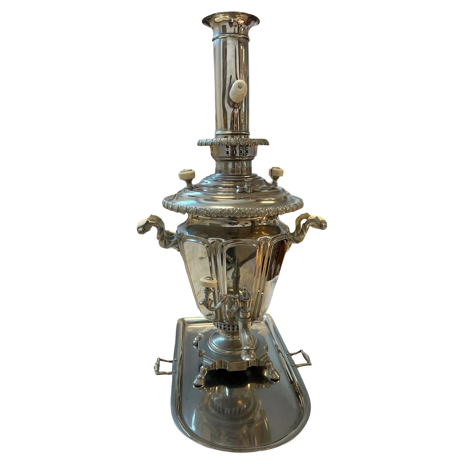 Russian Silver Plate Samovar with Tray Set: - The set is made out of silver plate with celluloid/ bone details - The samovar features floral & geometric motifs - The tray stamped with makers marks that are a little worn off
