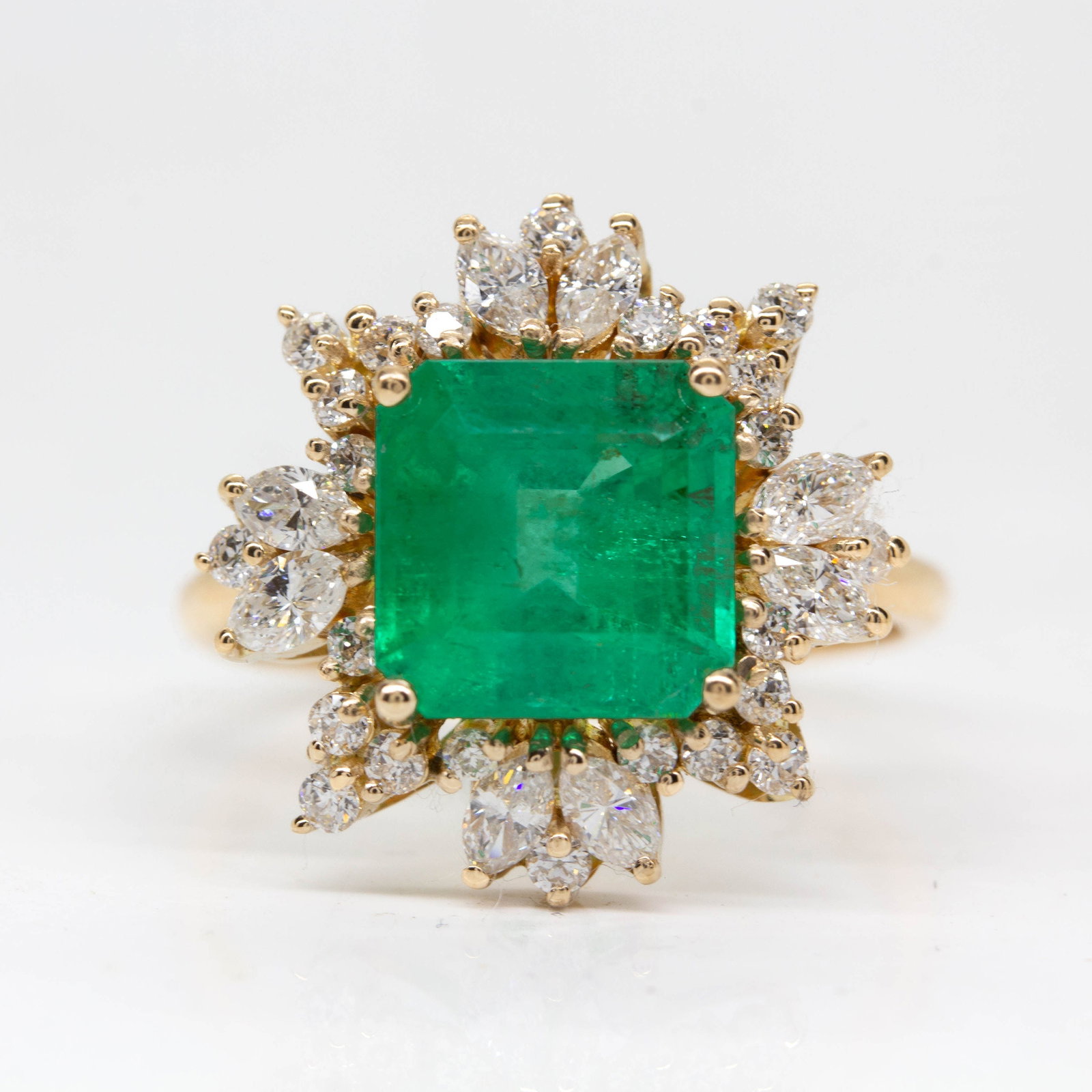 ALEXANDRIA RING: Made in 18k Rose Gold 1 Natural Colombian Emerald 2,92 ctw 8 Marquise Cut Diamonds h vs1 - 0,35 ctw 24 Old Mine Cut Diamonds hvs1 0,25 ctw Ring Size: 6 1/2 Ring Measurement: 16mm by 16mm by 7mm Total 