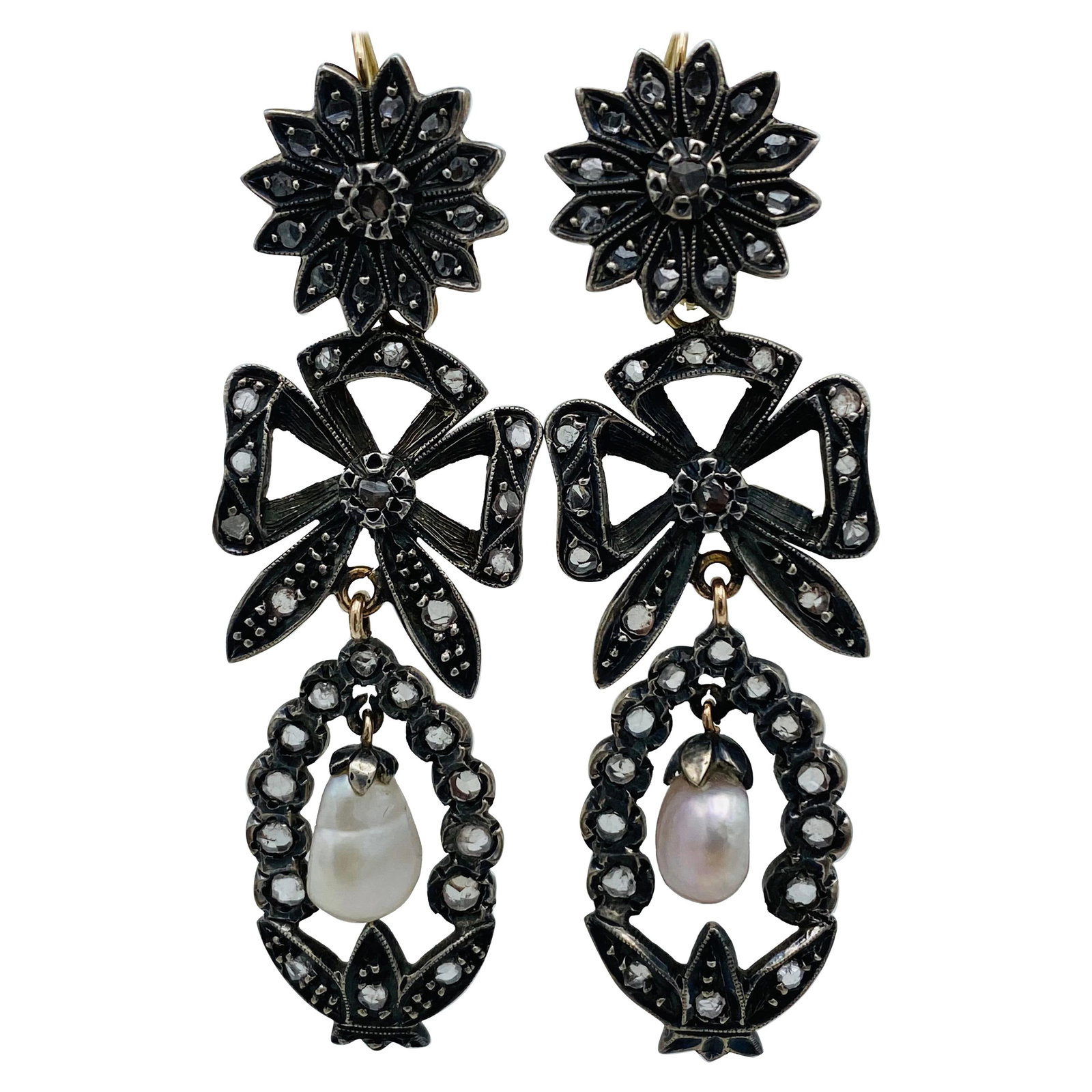 Georgian Gold and Silver, Rose Cut Diamonds and Pearl Day and Night Earrings: Featuring floral motif, rose cut diamonds set in silver on the front and gold finish on the back with natural pearl detail. Interchangeable design. Reserve: $4,400.00 Shipping: Domestic: Flat-rate of
