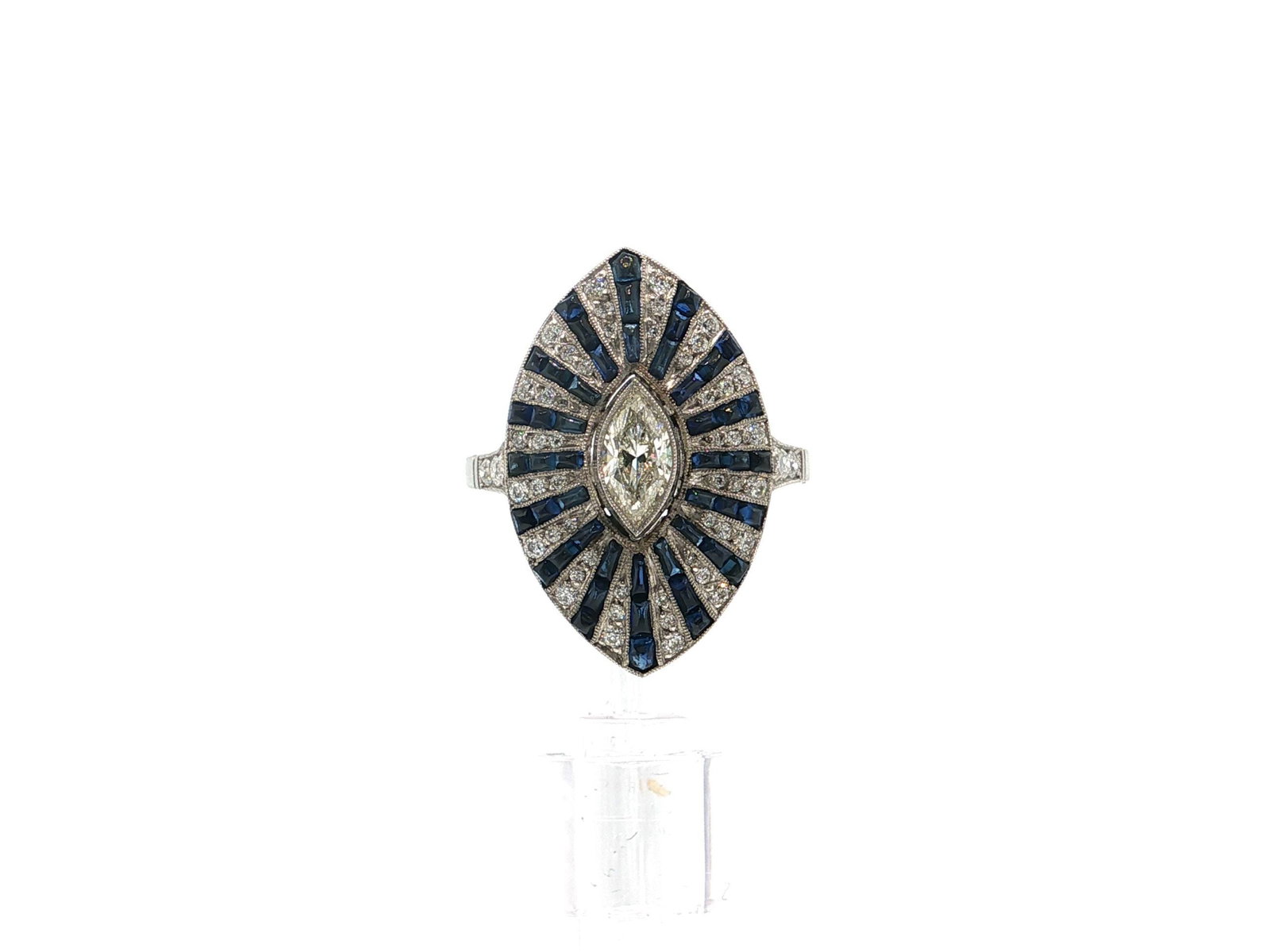 Vintage-Inspired Marquise Blue Sapphire Filigree Cocktail Ring in Platinum: This an exquisite marquise cut ring with a central marquise cut diamond of H color and VS1 clarity that weighs 0.50ctw. This ring also showcases 63 old mine cut diamonds of H color and VS1 clarity tha