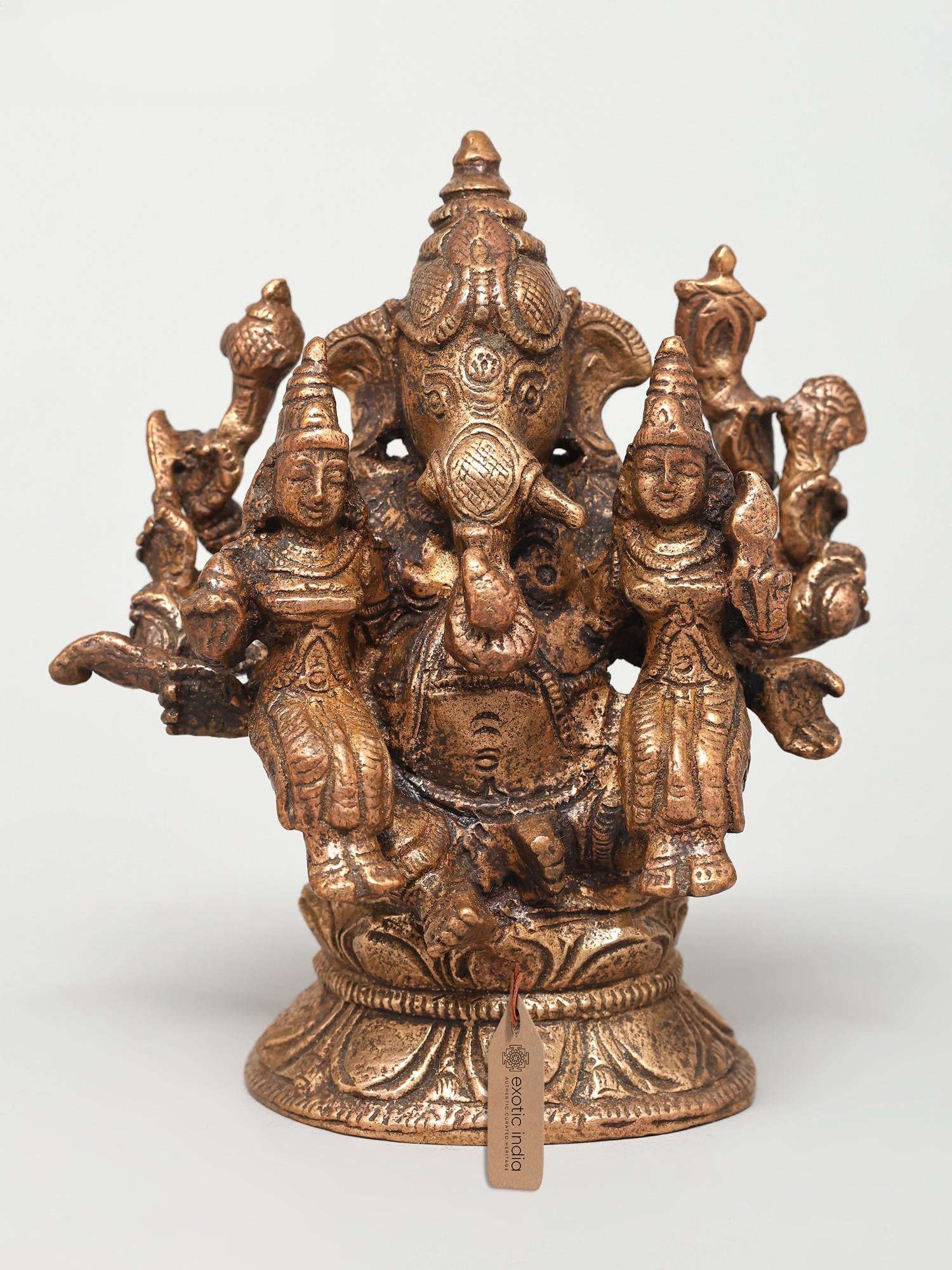 3" Small Shri Vallabh Ganapati | Copper Statue: The Benevolent Lord of Beginnings This exquisite copper statue captures the divine essence of Lord Ganesha, the beloved elephant-headed deity revered as the remover of obstacles, the patron of arts an