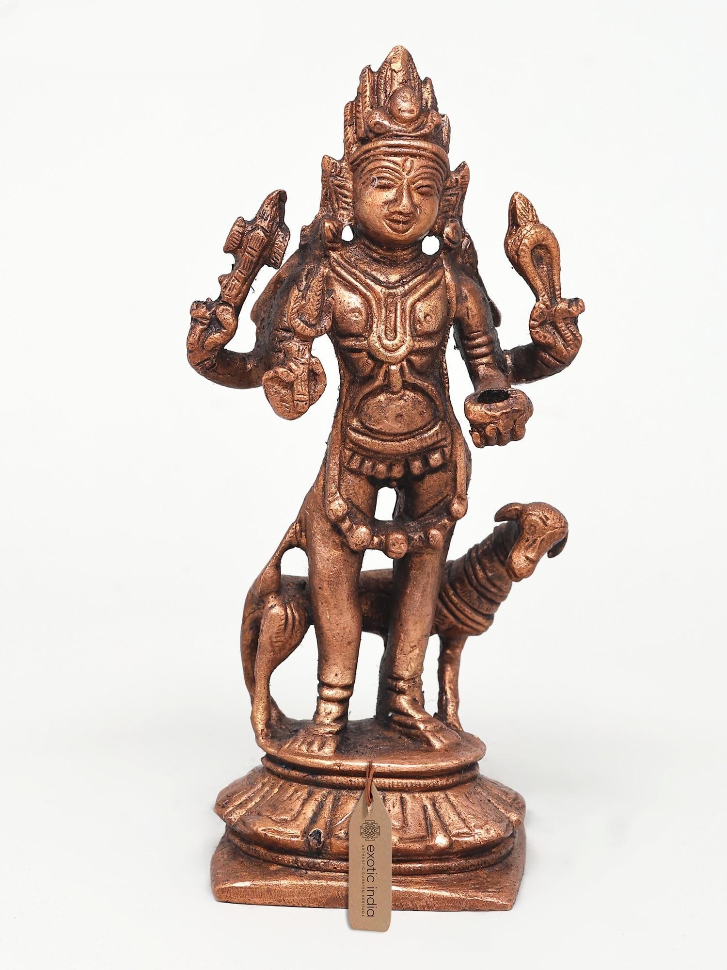 5" Small Lord Shiva as Bhairava | Copper Statue: Embodiment of Fierce Benevolence: Lord Shiva as Bhairava This exquisite copper statue captures the formidable yet protective essence of Lord Shiva in his fierce manifestation as Bhairava. Standing at 